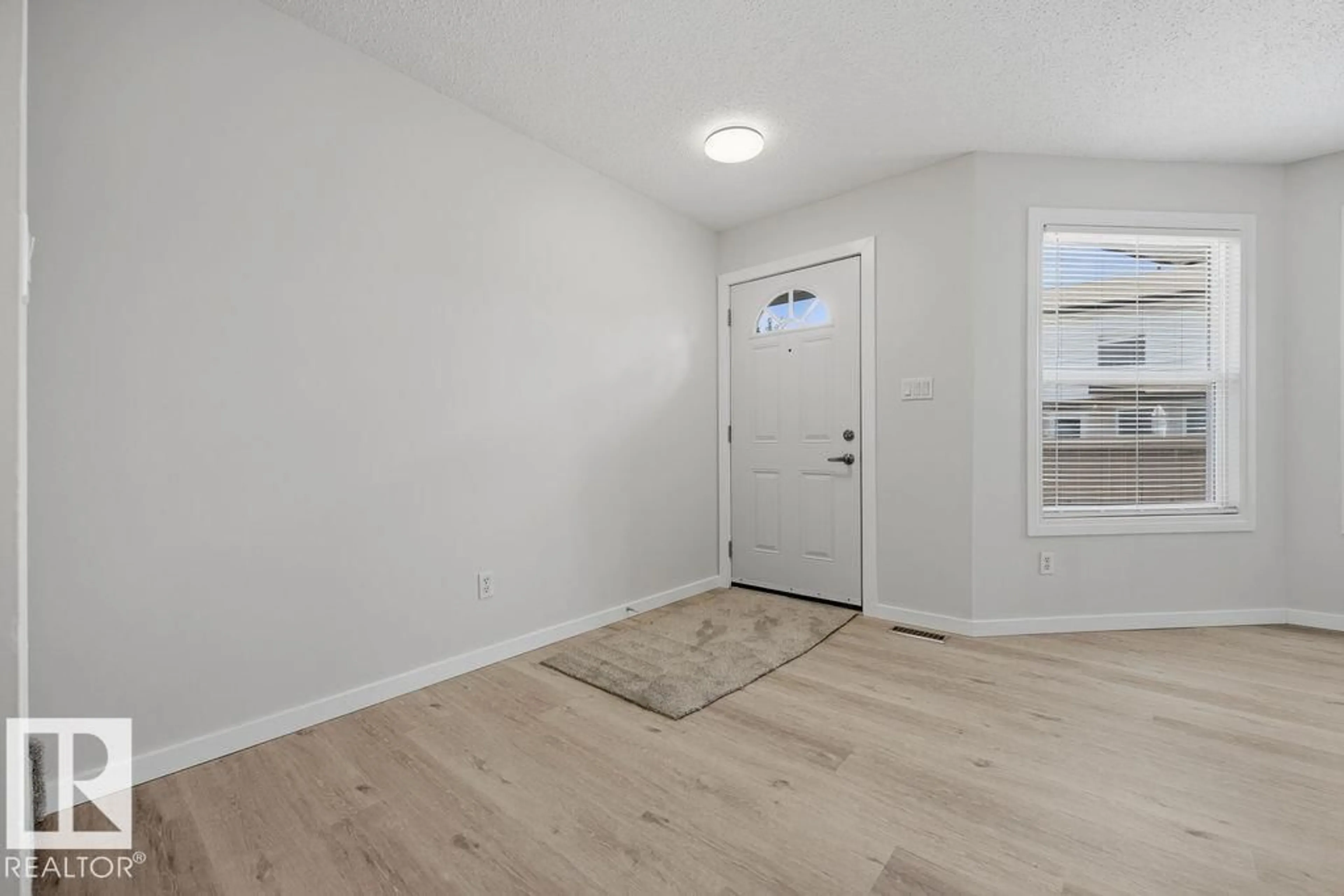 Indoor entryway for 10473 24 AV, Edmonton Alberta T6J4S2