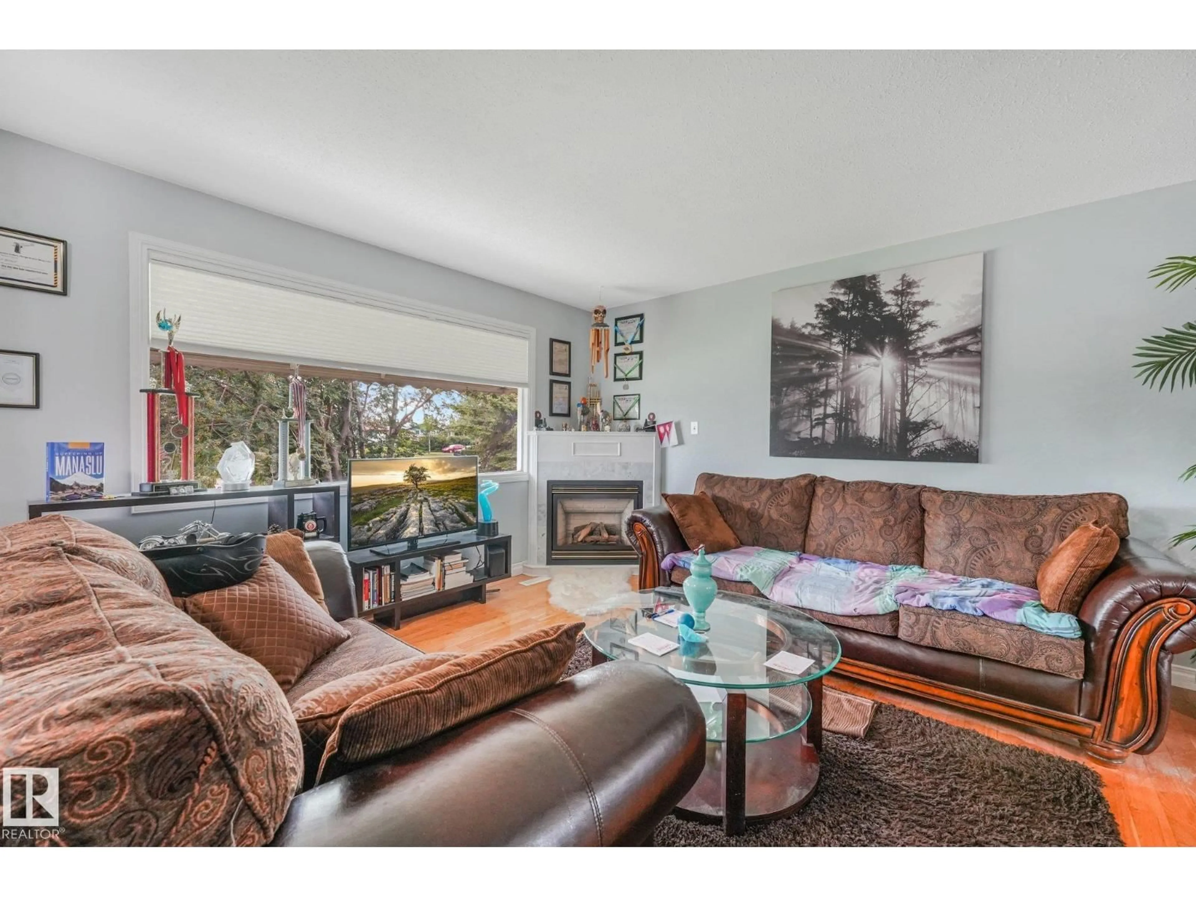 Living room with furniture, unknown for 8712 137 AV, Edmonton Alberta T5E1Y4