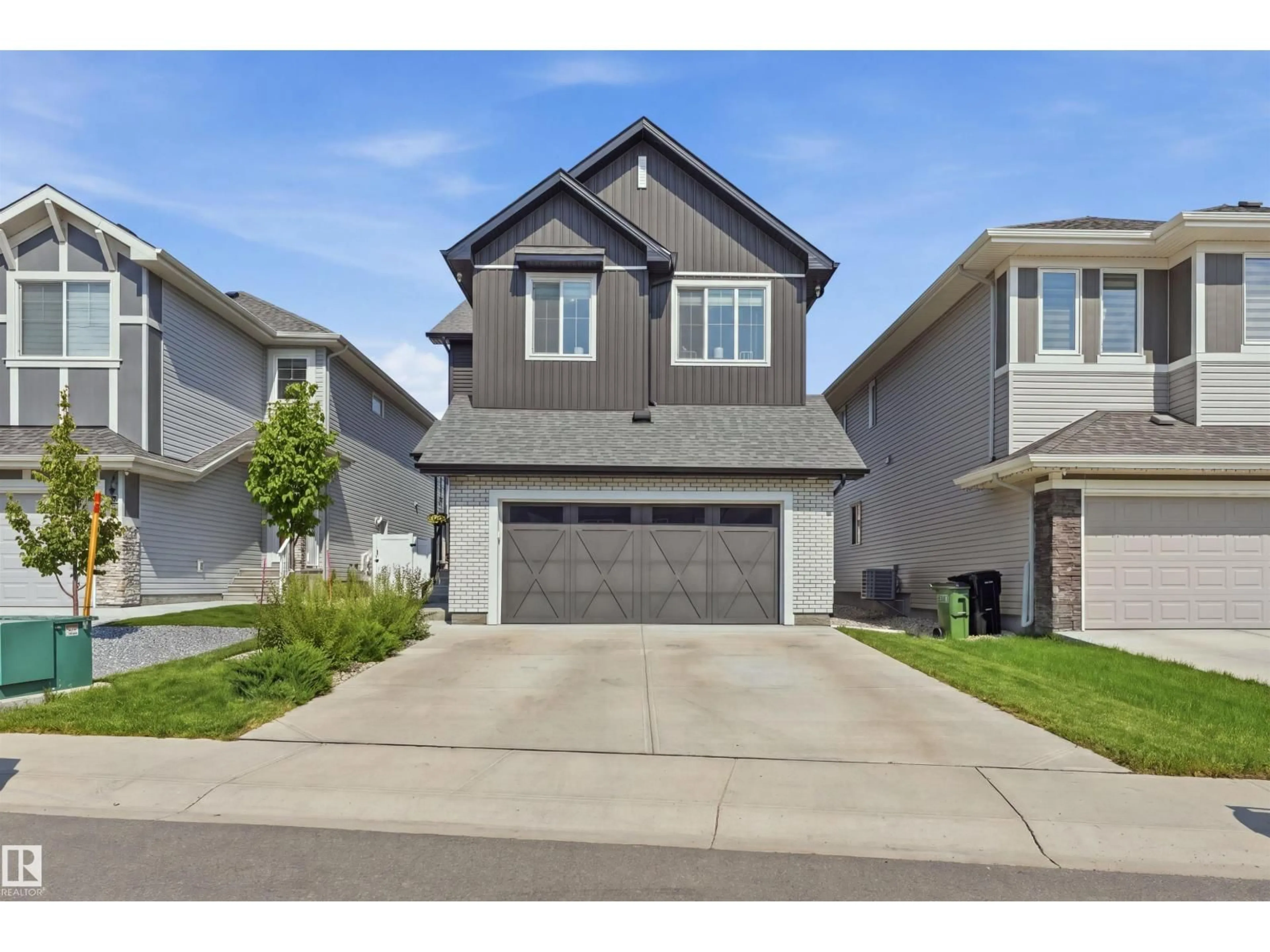 Home with vinyl exterior material, street for NW - 4618 170A AV, Edmonton Alberta T5Y4C9