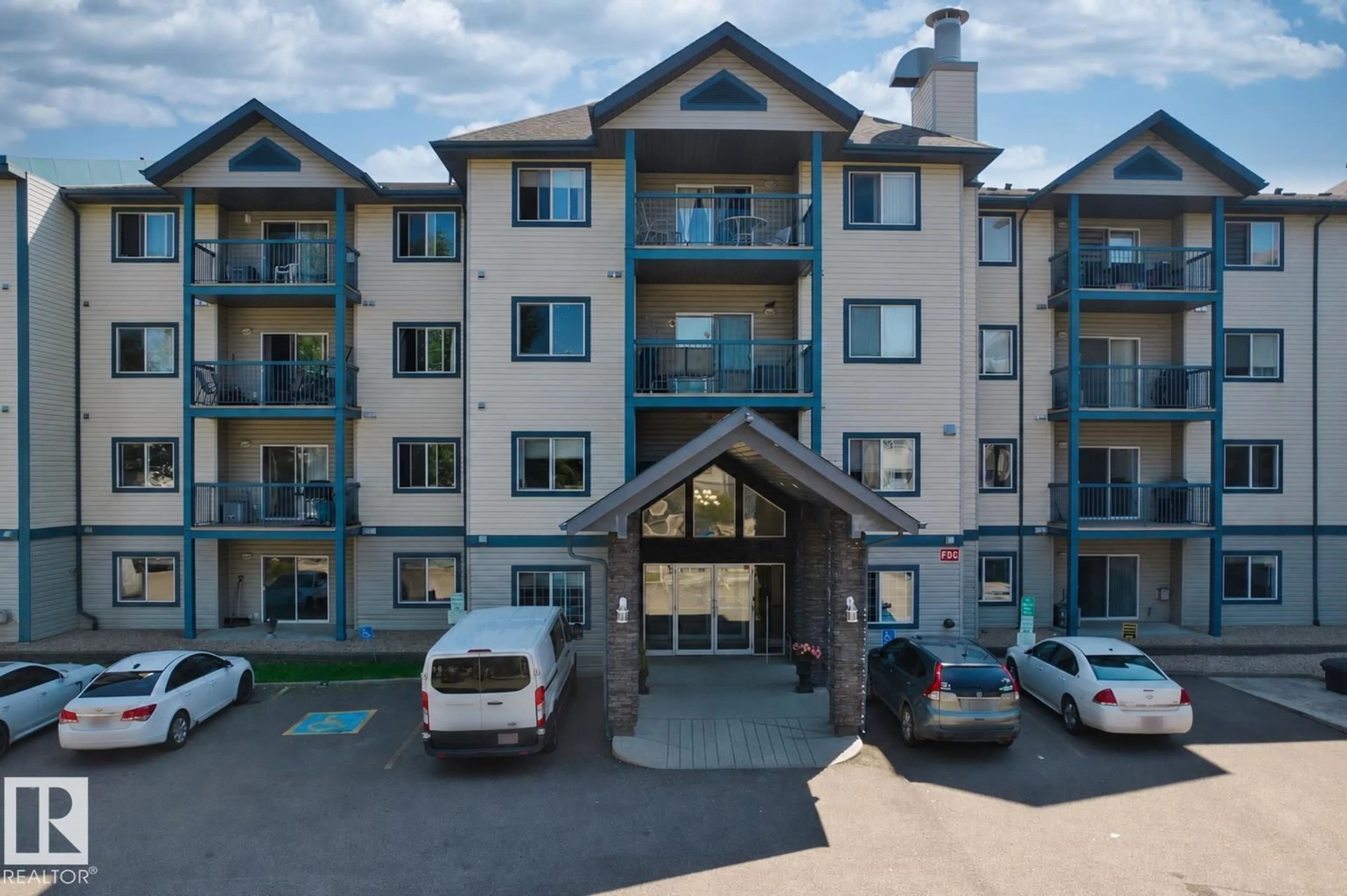 A pic from outside/outdoor area/front of a property/back of a property/a pic from drone, mountain view for #224 - 16303 95 ST, Edmonton Alberta T5Z3V1