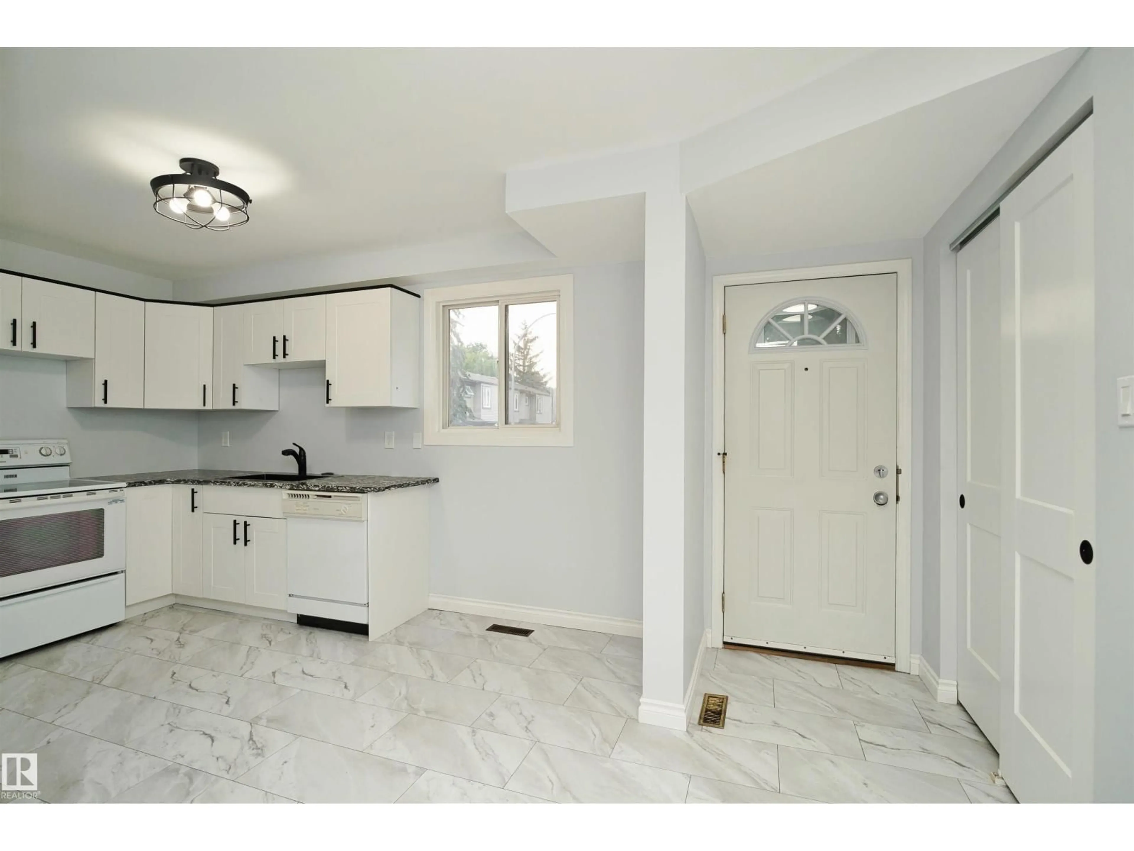 Open concept kitchen, ceramic/tile floor for 1679 LAKEWOOD RD, Edmonton Alberta T6K3B9