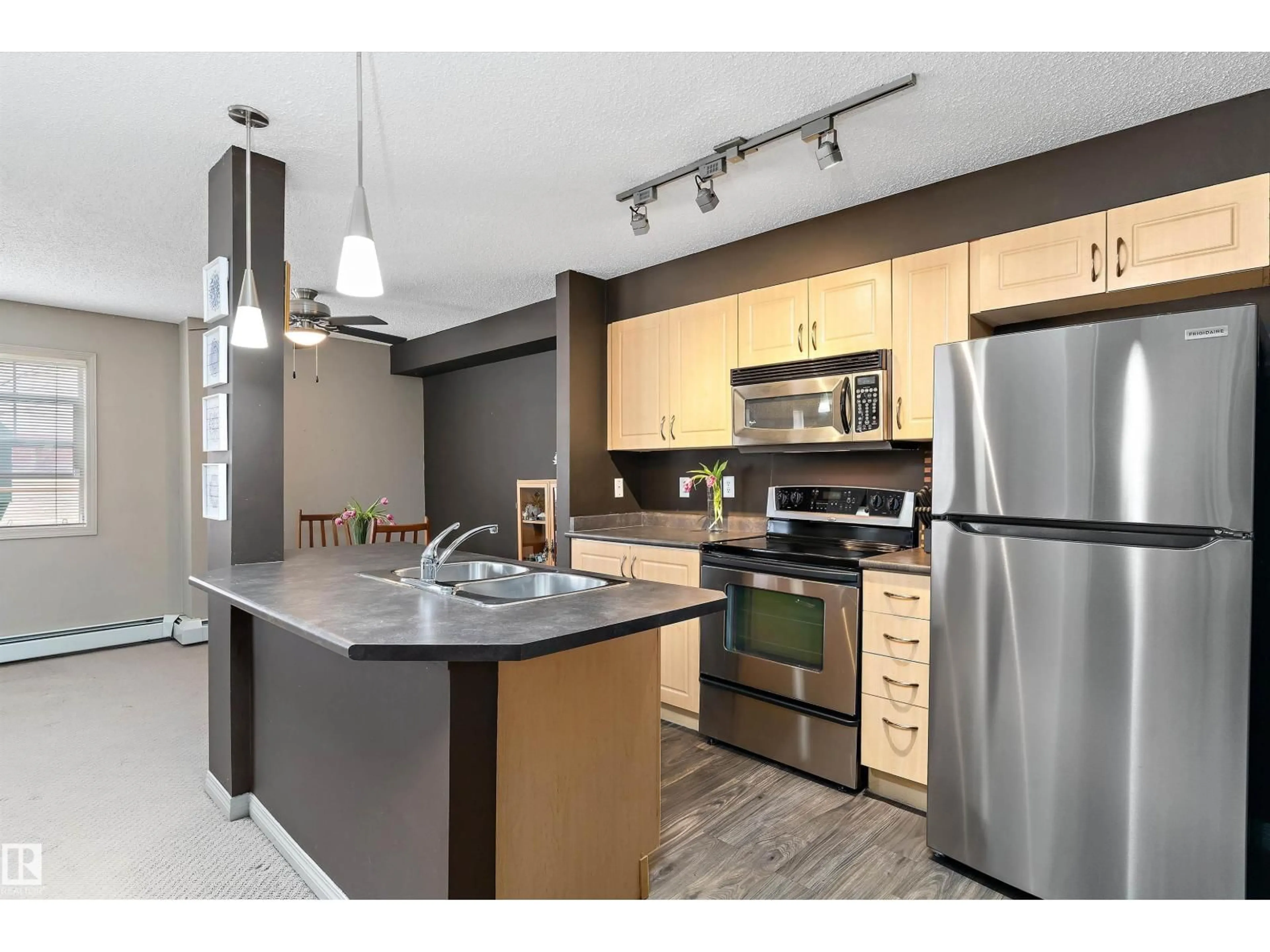Standard kitchen, wood/laminate floor for #111 - 11445 ELLERSLIE RD SW, Edmonton Alberta T6W1T1
