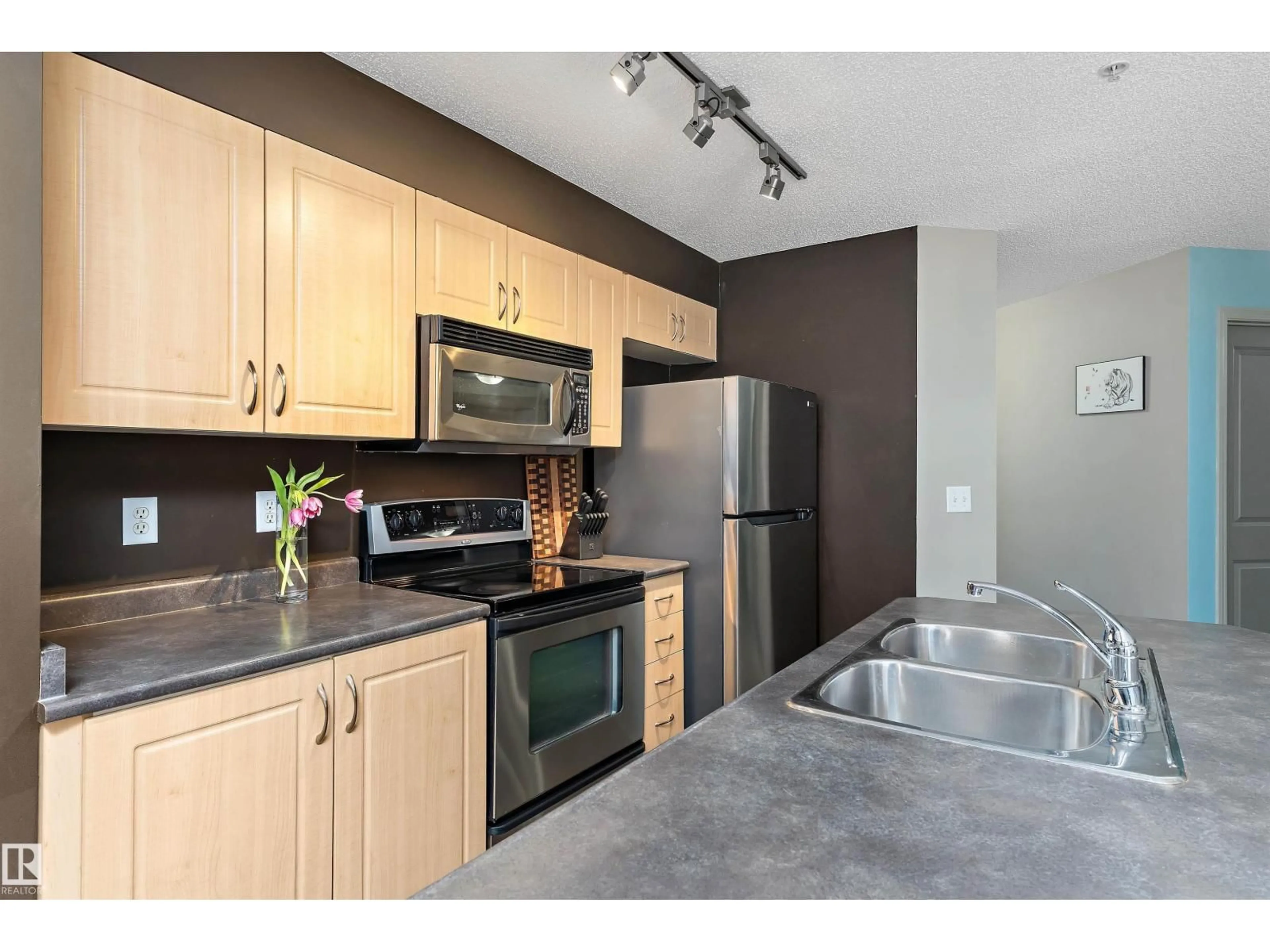 Standard kitchen, wood/laminate floor for #111 - 11445 ELLERSLIE RD SW, Edmonton Alberta T6W1T1