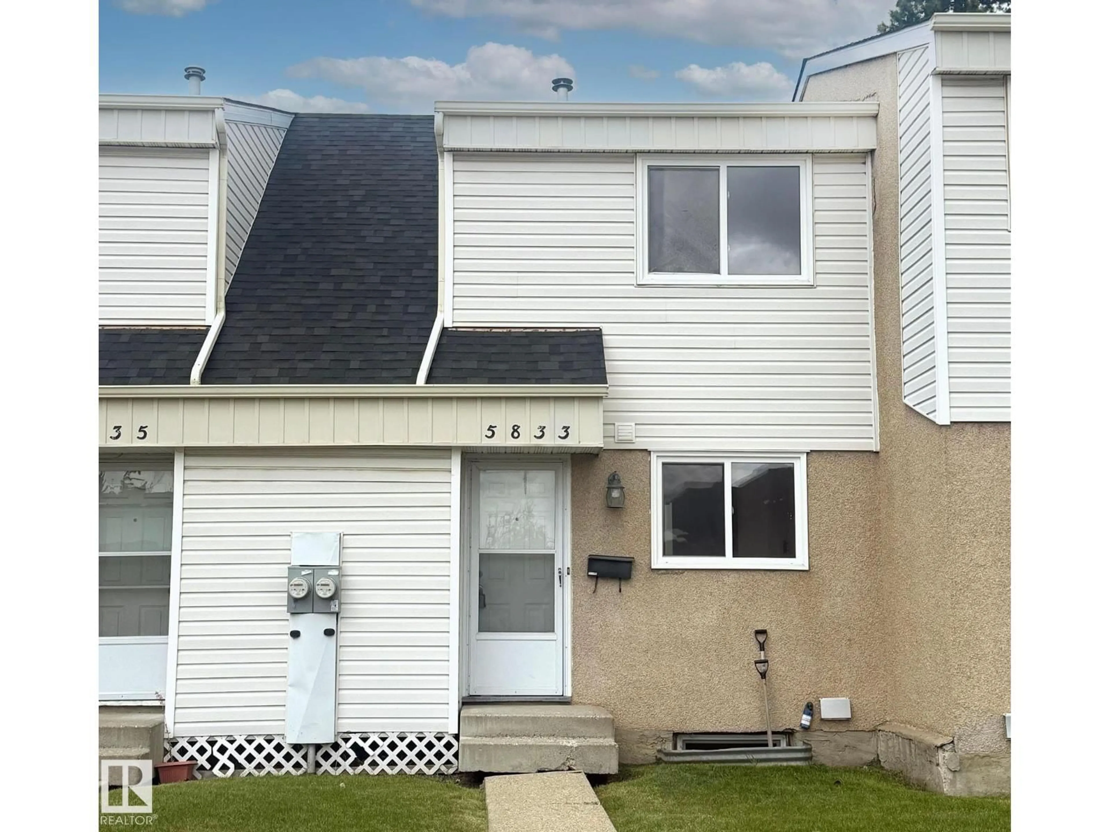 Home with vinyl exterior material, street for 5833 RIVERBEND RD, Edmonton Alberta T6H5A8