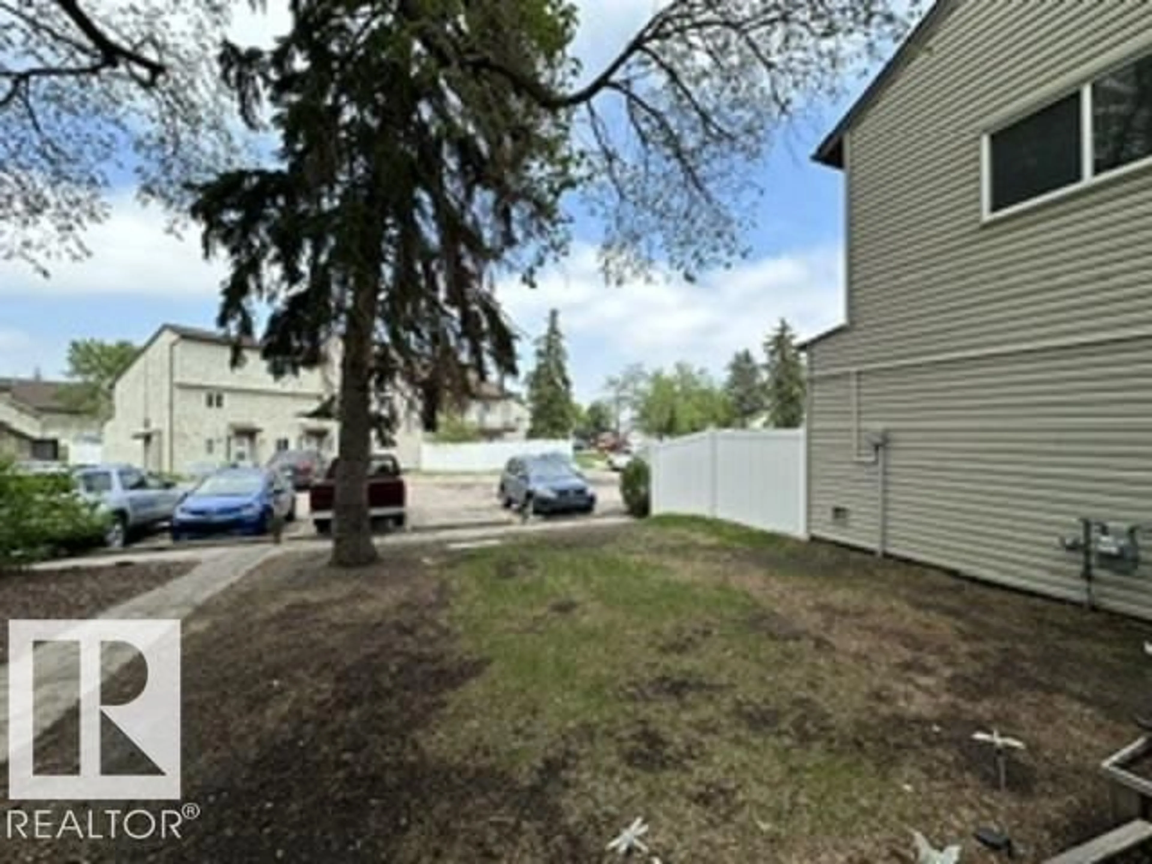 A pic from outside/outdoor area/front of a property/back of a property/a pic from drone, street for 12C MEADOWLARK VG, Edmonton Alberta T5R5X3