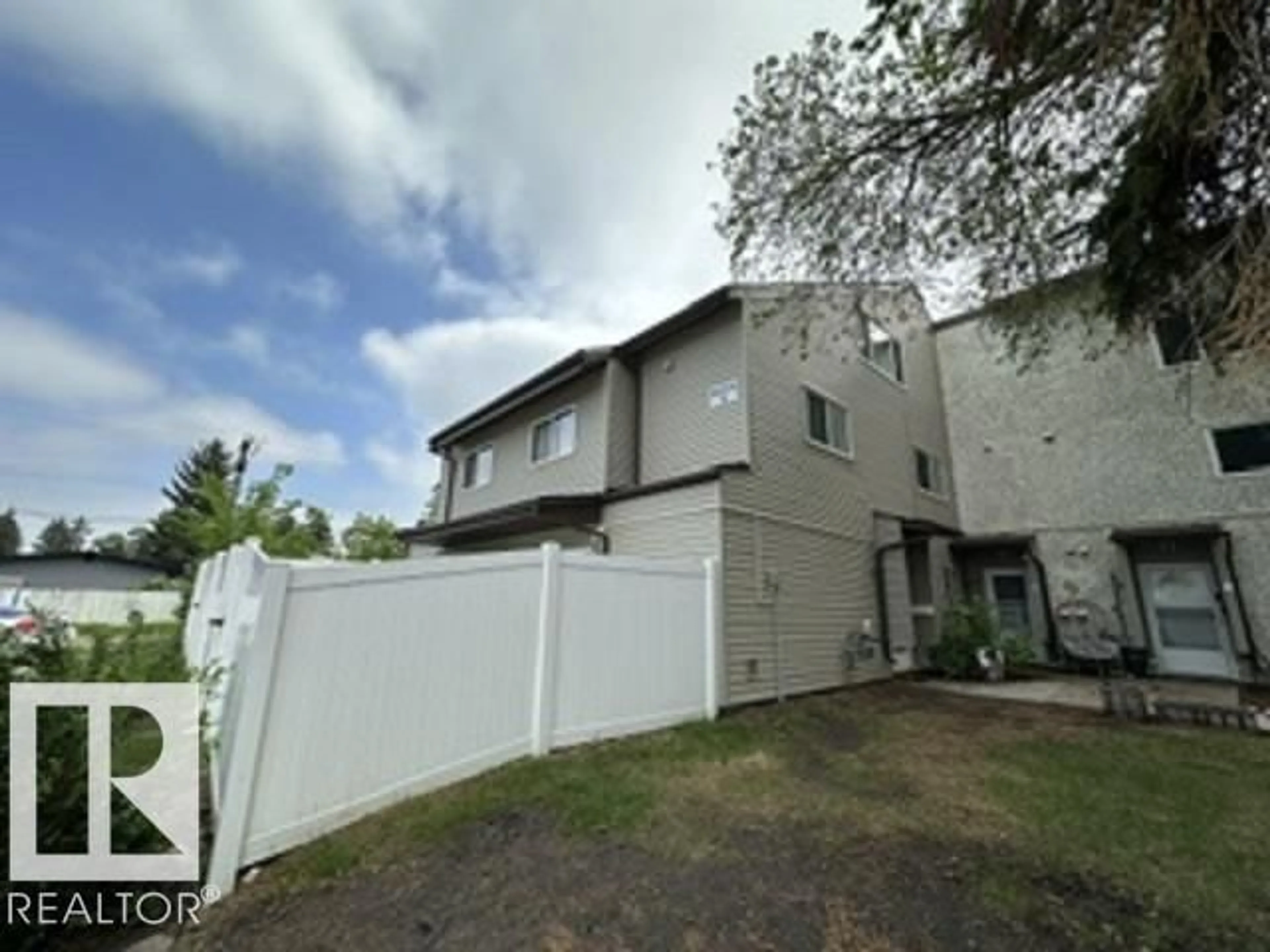 A pic from outside/outdoor area/front of a property/back of a property/a pic from drone, street for 12C MEADOWLARK VG, Edmonton Alberta T5R5X3