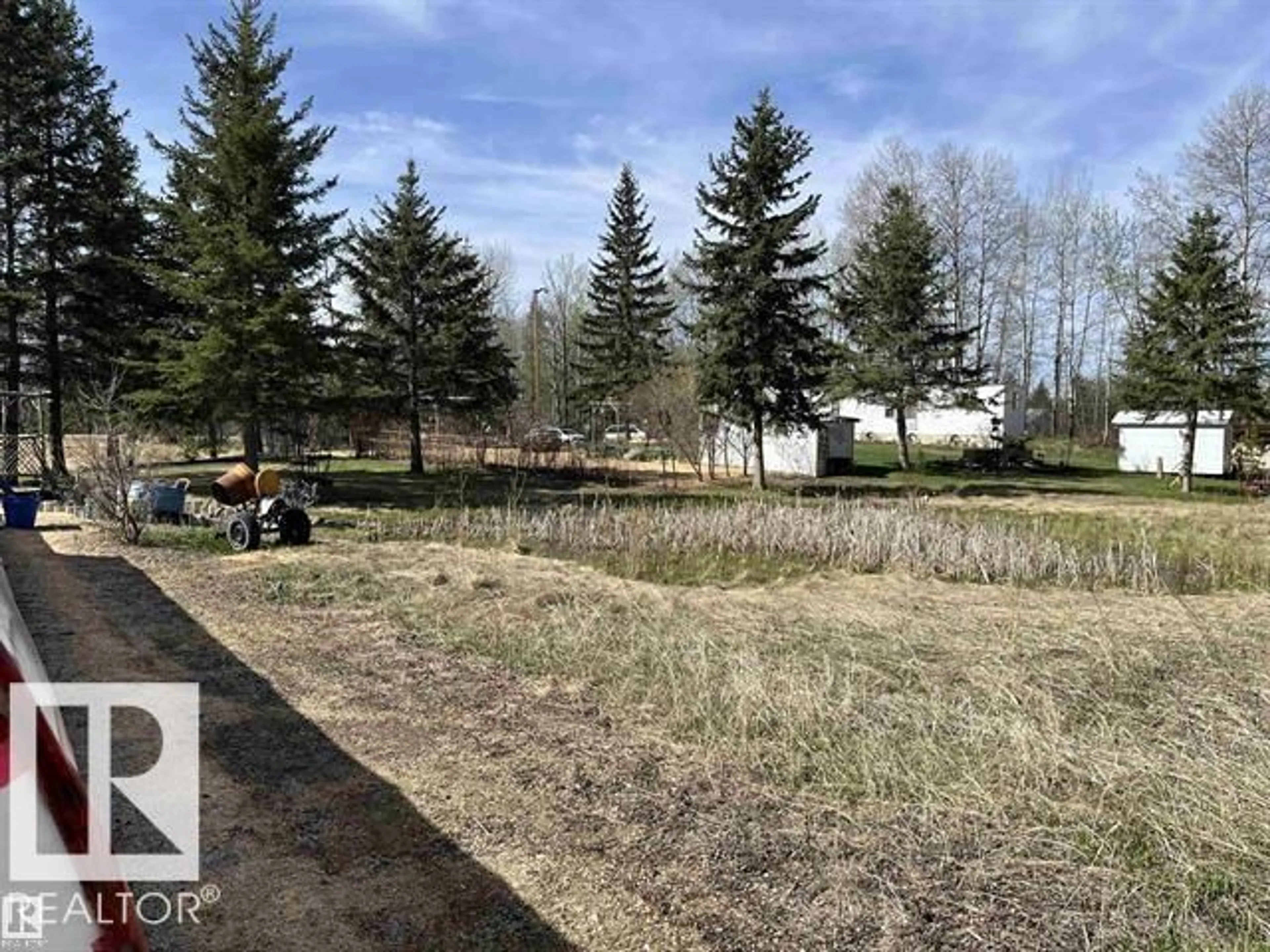 A pic from outside/outdoor area/front of a property/back of a property/a pic from drone, forest/trees view for 210 - 55504 NIKOODI RD, Rural Lac Ste. Anne County Alberta T0E0X0