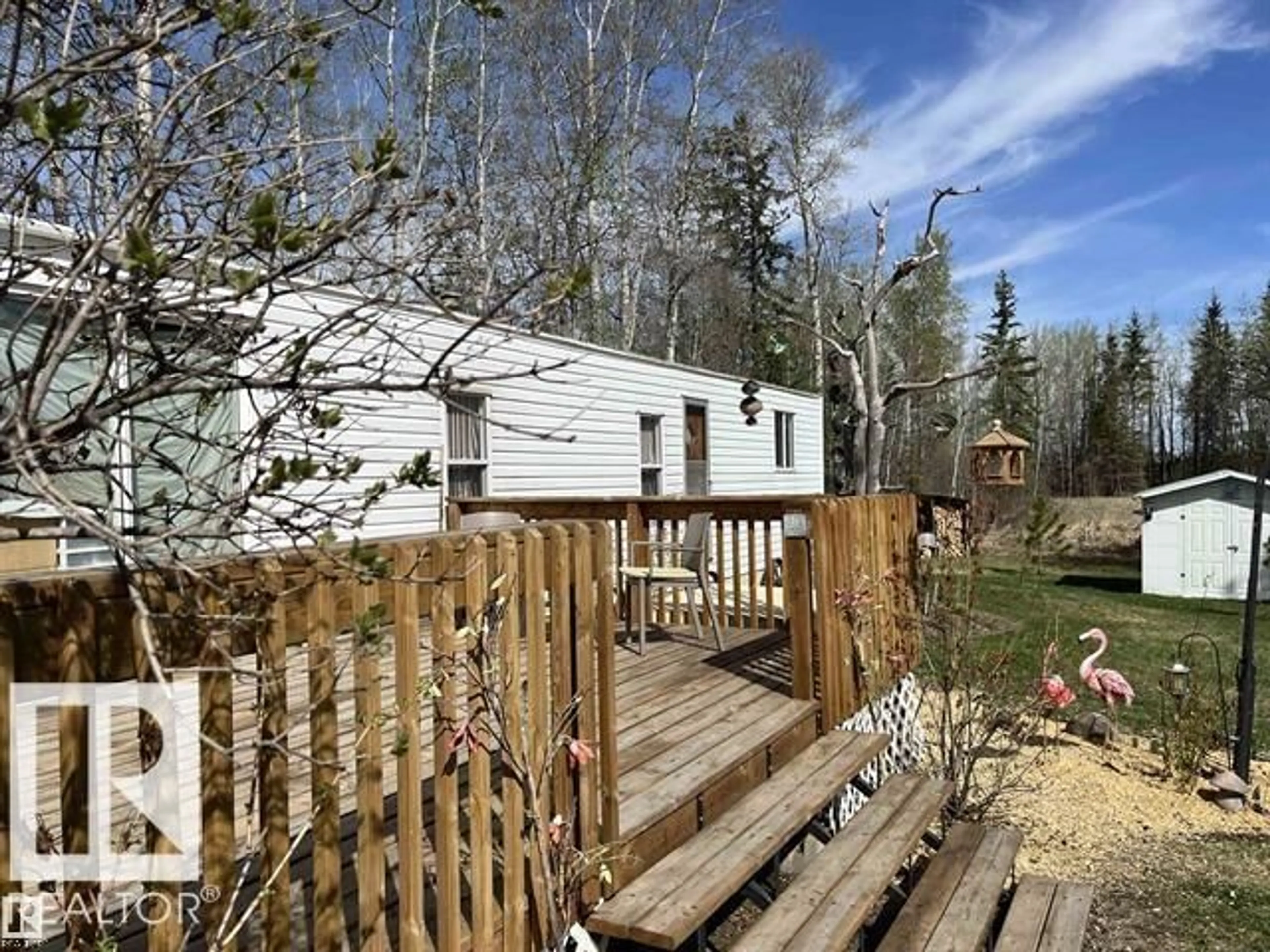 A pic from outside/outdoor area/front of a property/back of a property/a pic from drone, forest/trees view for 210 - 55504 NIKOODI RD, Rural Lac Ste. Anne County Alberta T0E0X0