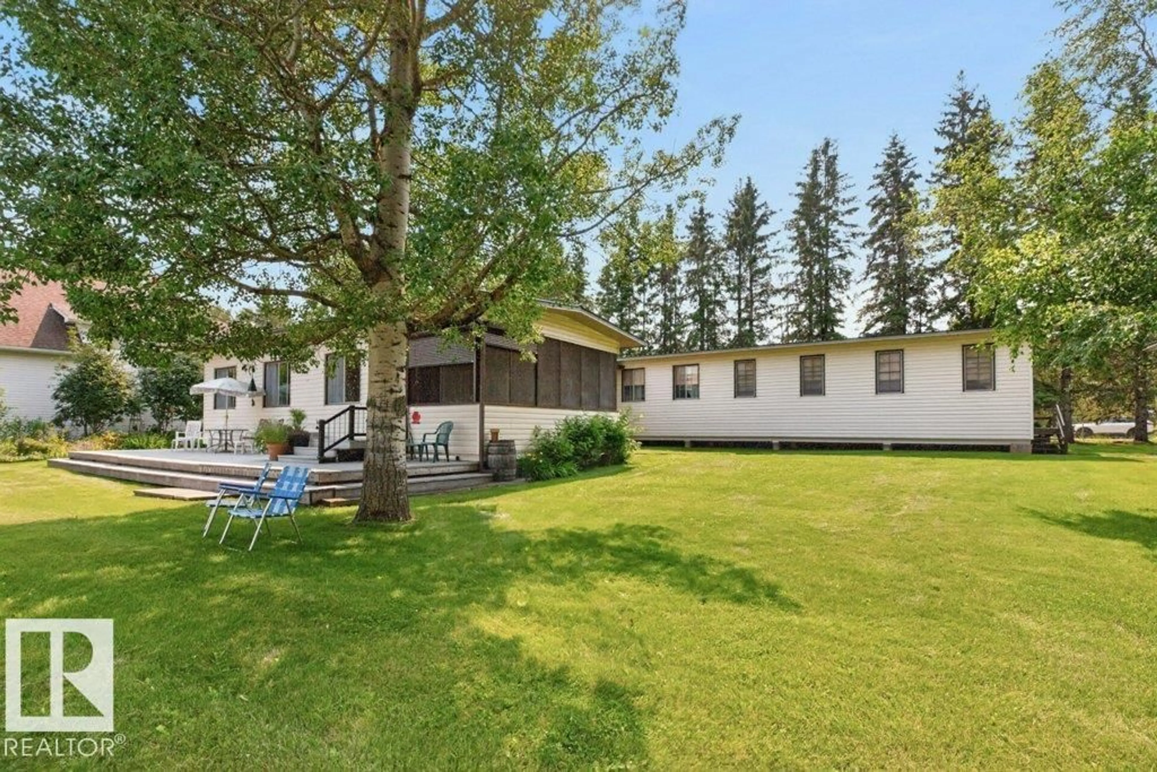A pic from outside/outdoor area/front of a property/back of a property/a pic from drone, mountain view for 506 - 54411 RGE ROAD 40, Rural Lac Ste. Anne County Alberta T0E2E0