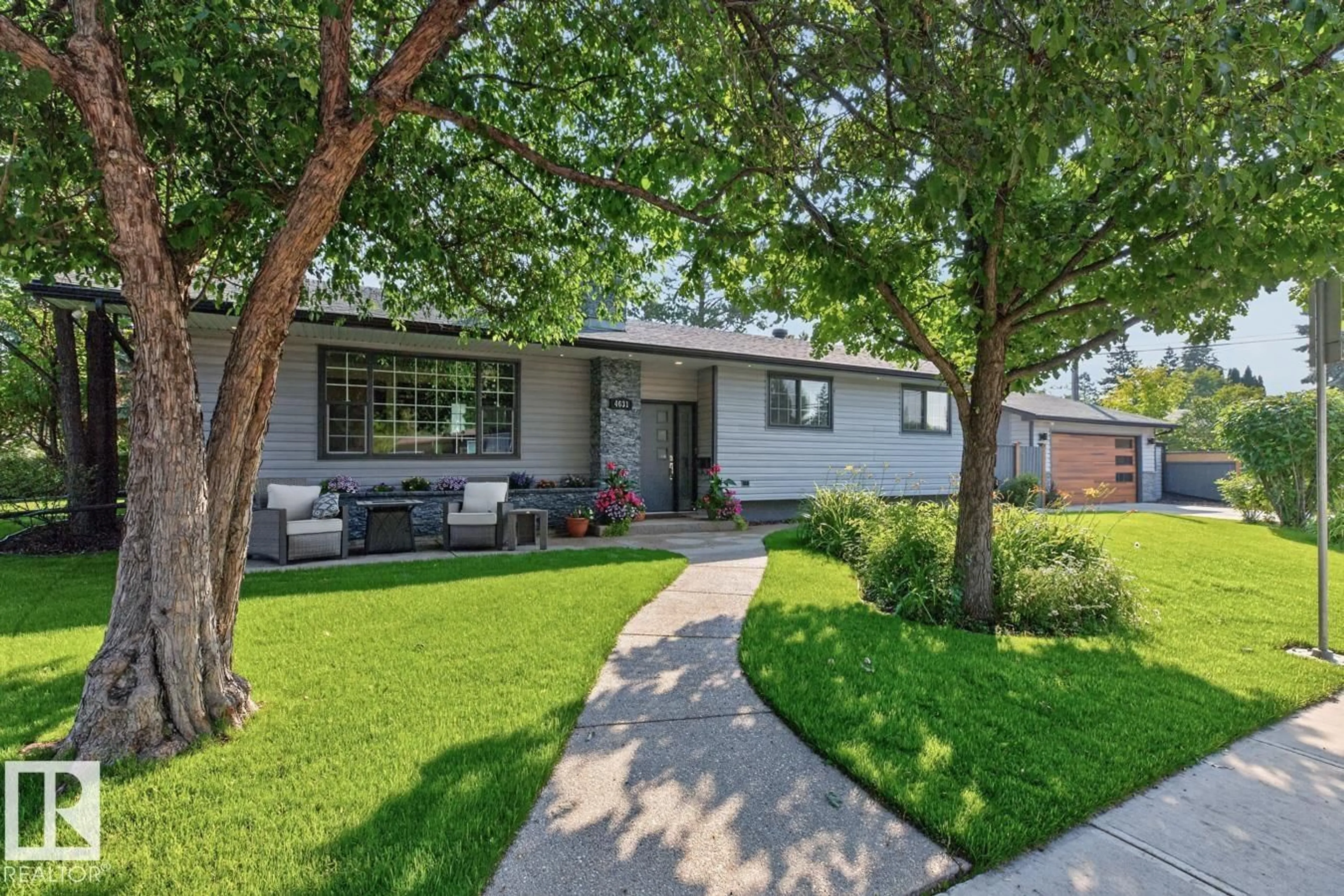 Home with vinyl exterior material, street for NW - 4631 113A ST, Edmonton Alberta T6H1A1