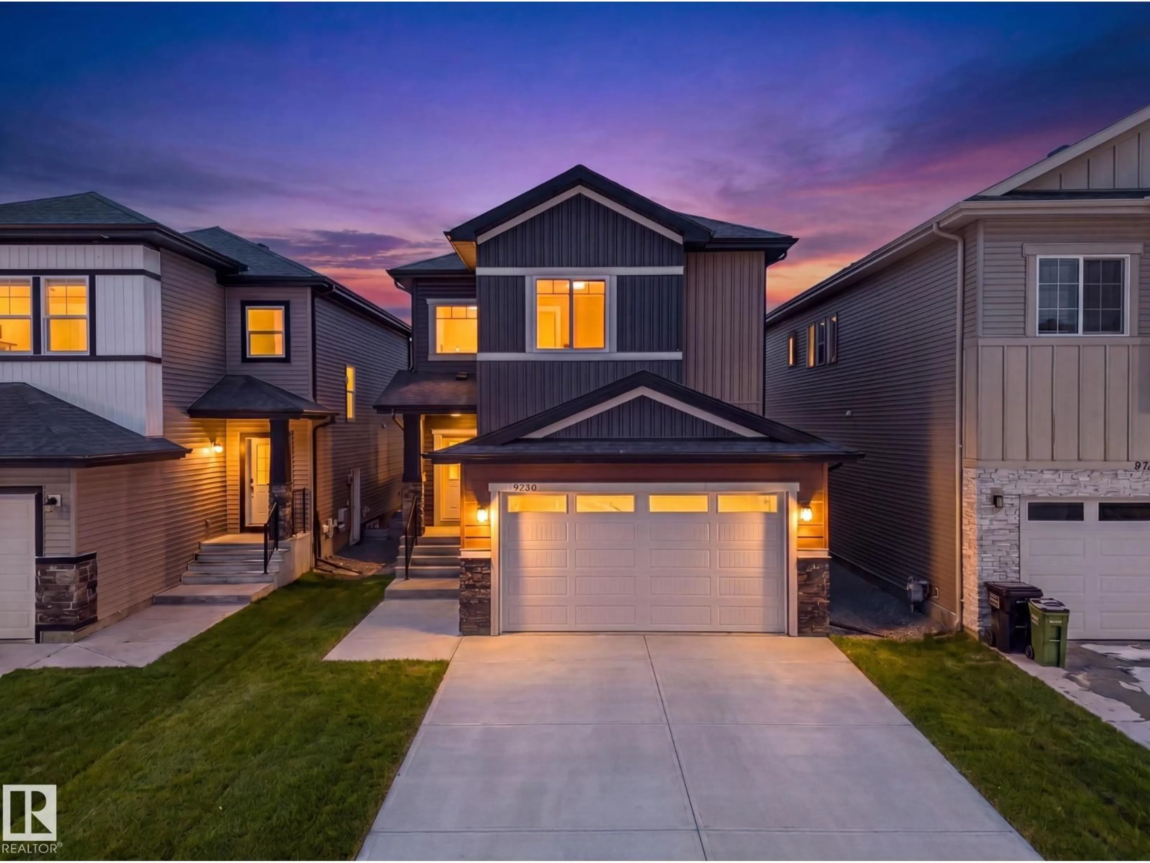 Home with brick exterior material, street for NW - 5736 176 AV, Edmonton Alberta T5Y0V2