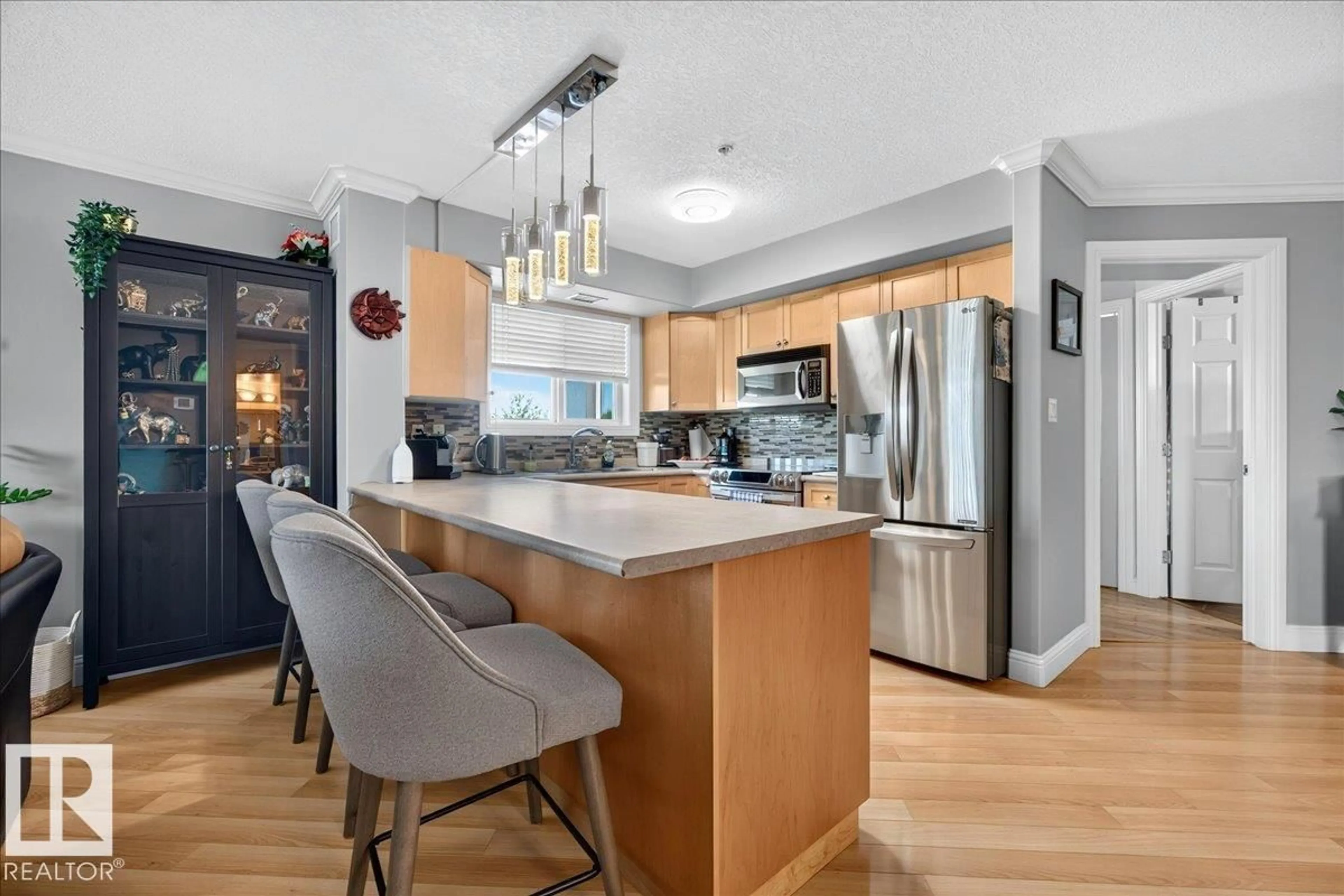Open concept kitchen, unknown for #306 - 13111 140 AV, Edmonton Alberta T6V0B1