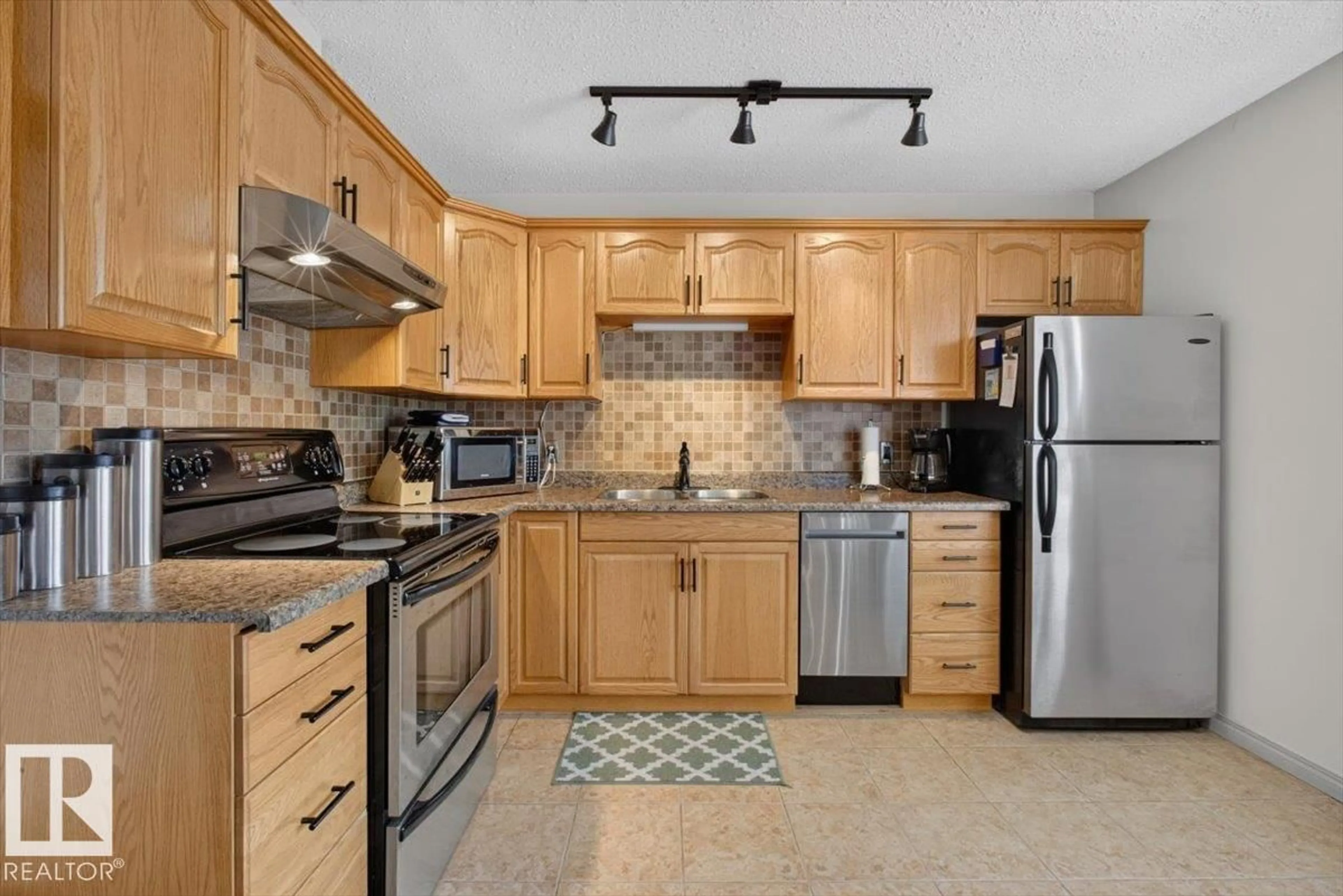 Standard kitchen, ceramic/tile floor for 17781 81 AV, Edmonton Alberta T5T1L4