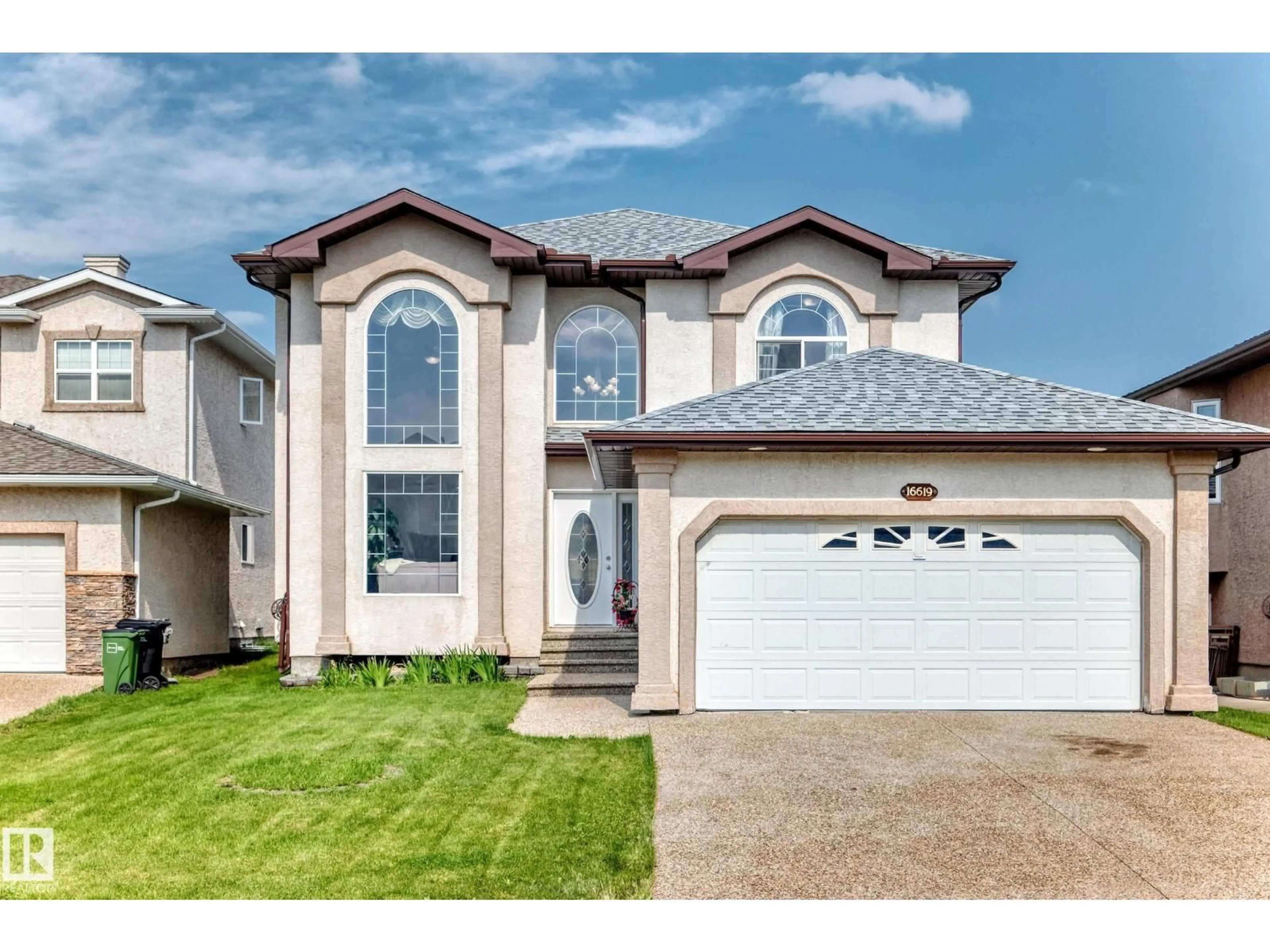 Home with vinyl exterior material, street for 16619 72 ST, Edmonton Alberta T5Z3Z7