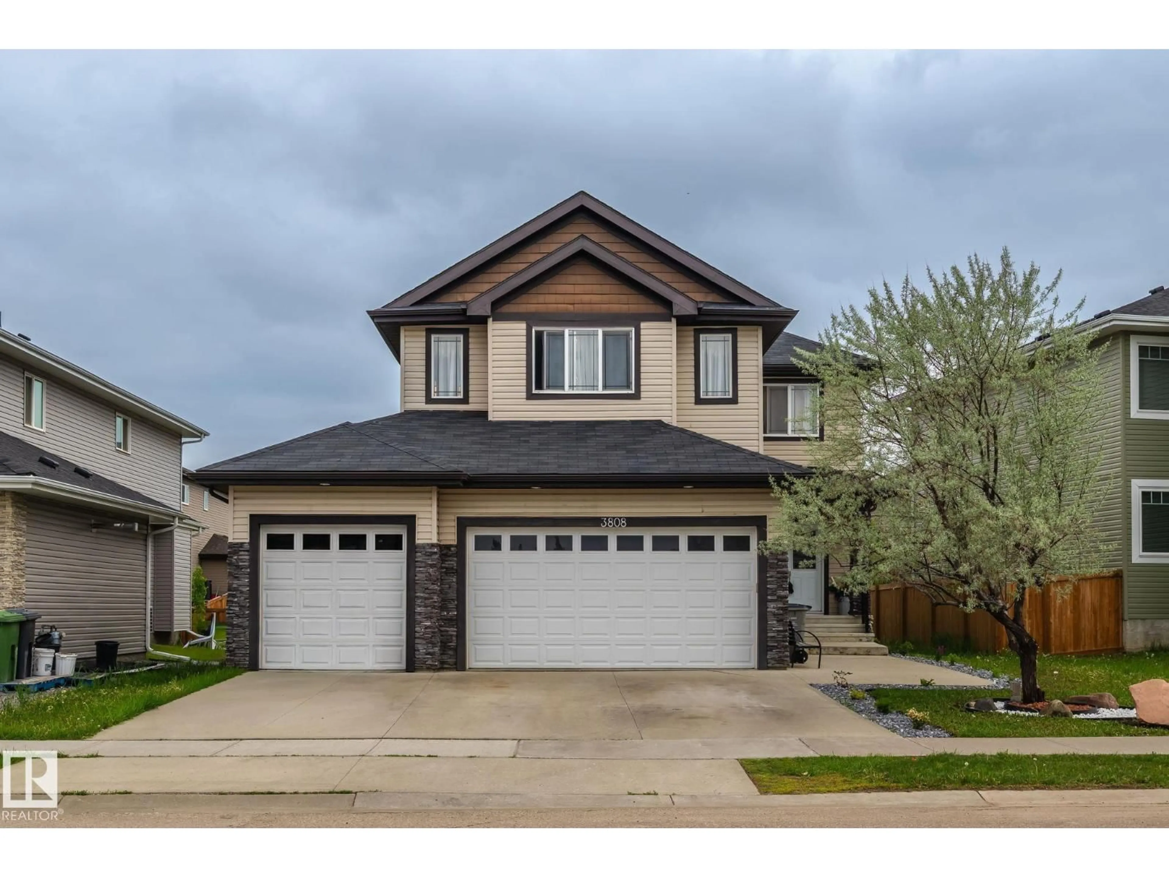 Home with vinyl exterior material, street for 3808 TRIOMPHE BV, Beaumont Alberta T4X0C4