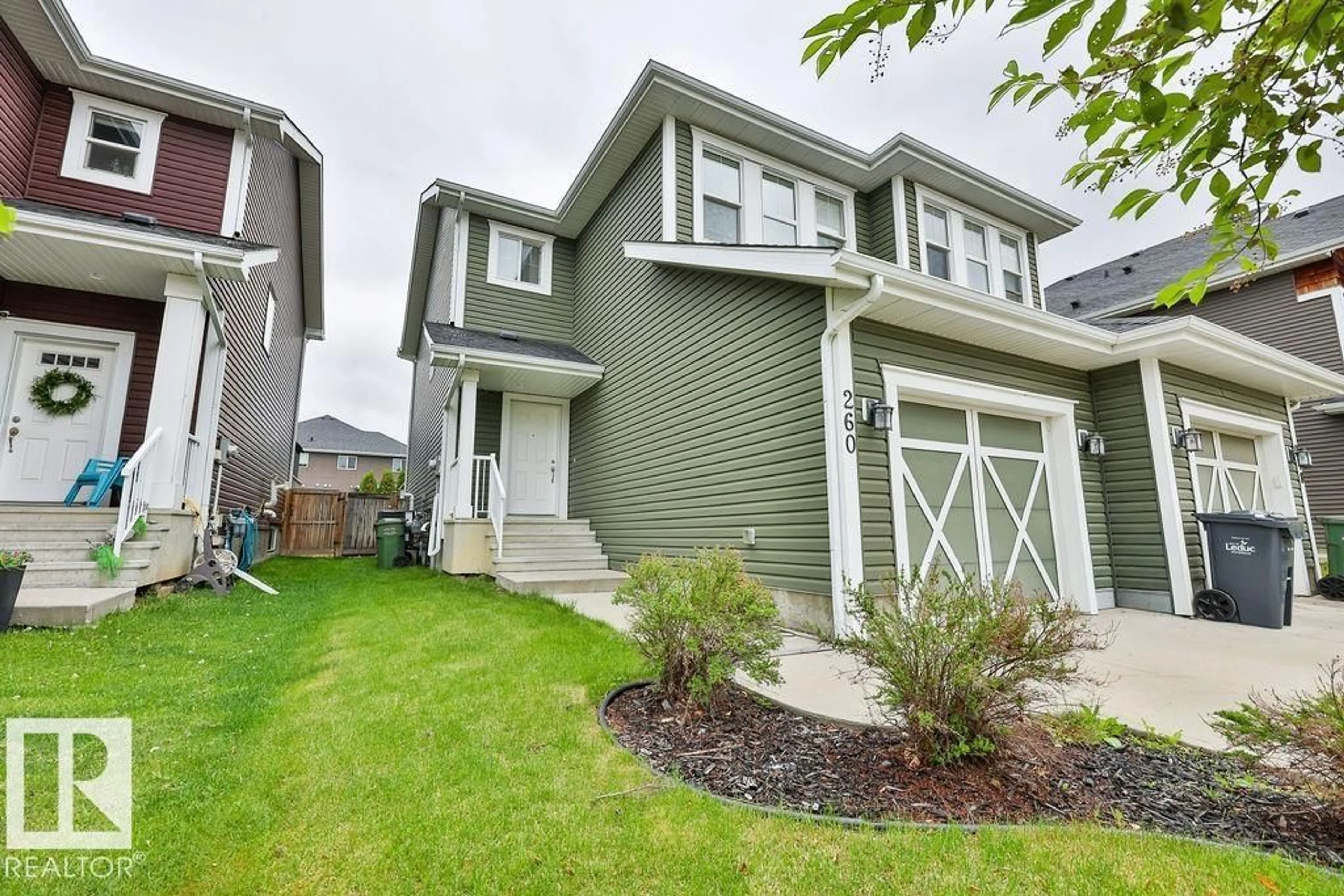 Home with vinyl exterior material, street for 260 STURTZ BN, Leduc Alberta T9E0X4