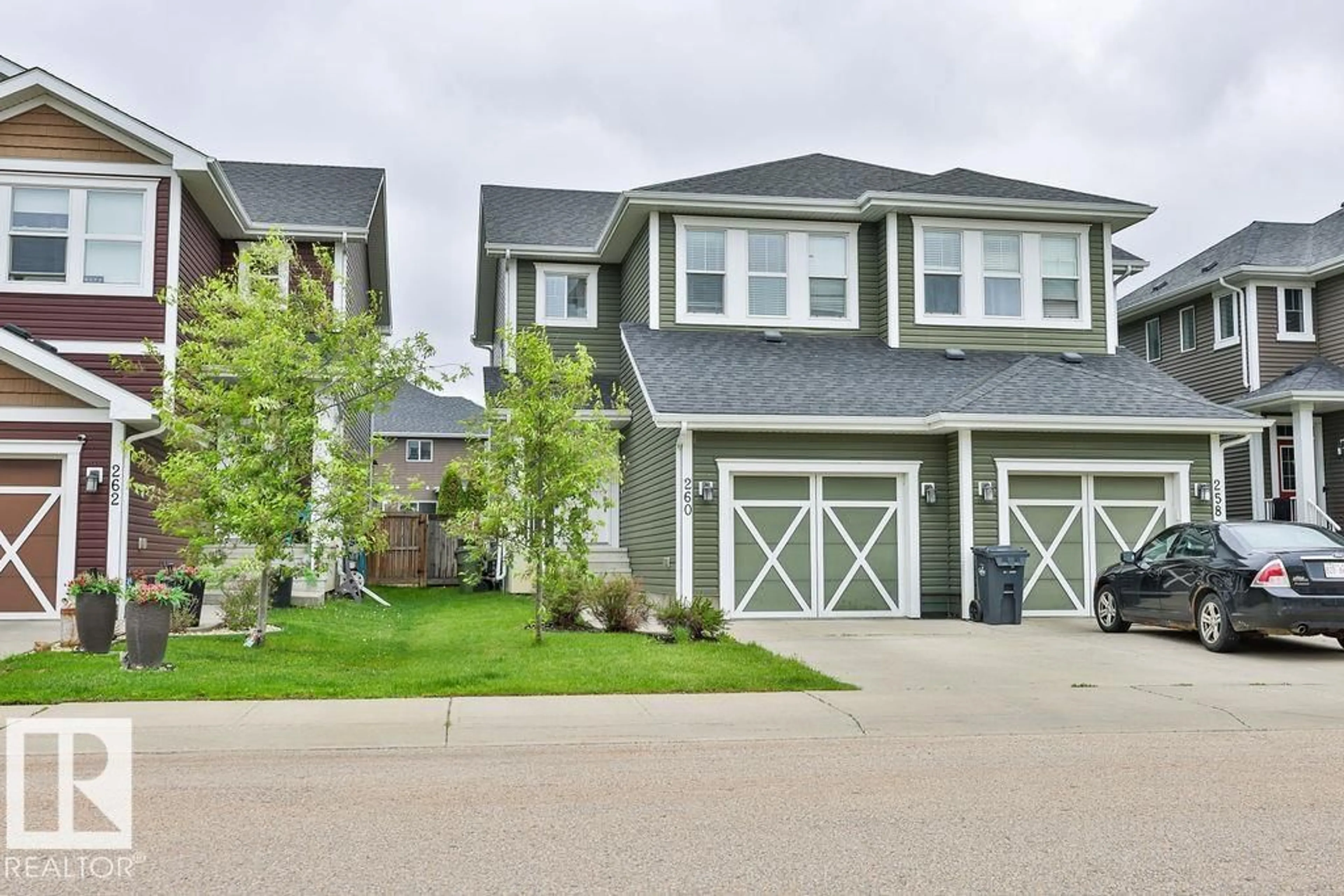 Home with vinyl exterior material, street for 260 STURTZ BN, Leduc Alberta T9E0X4