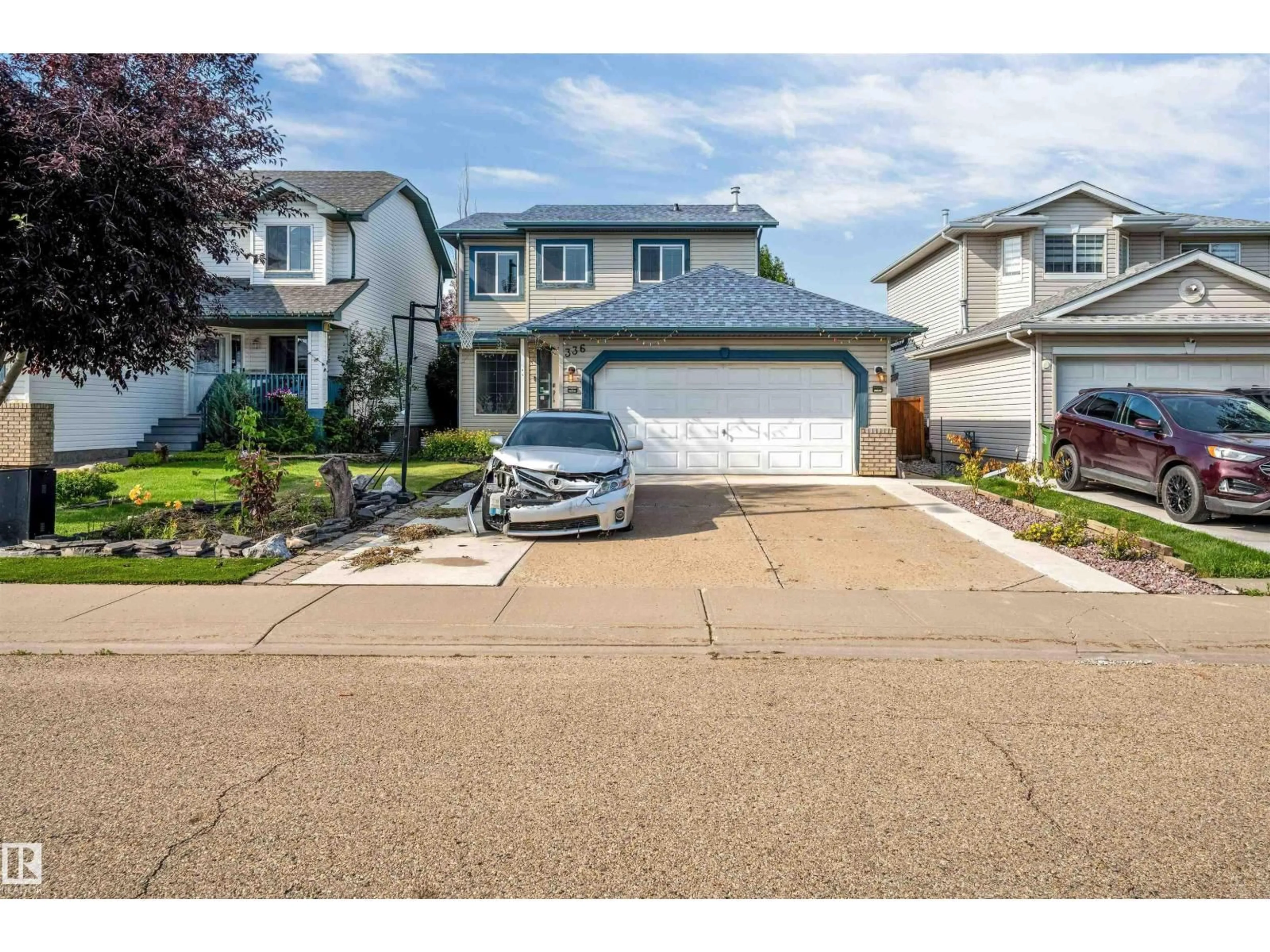 Home with vinyl exterior material, street for 336 WILD ROSE WY, Edmonton Alberta T6T1P3