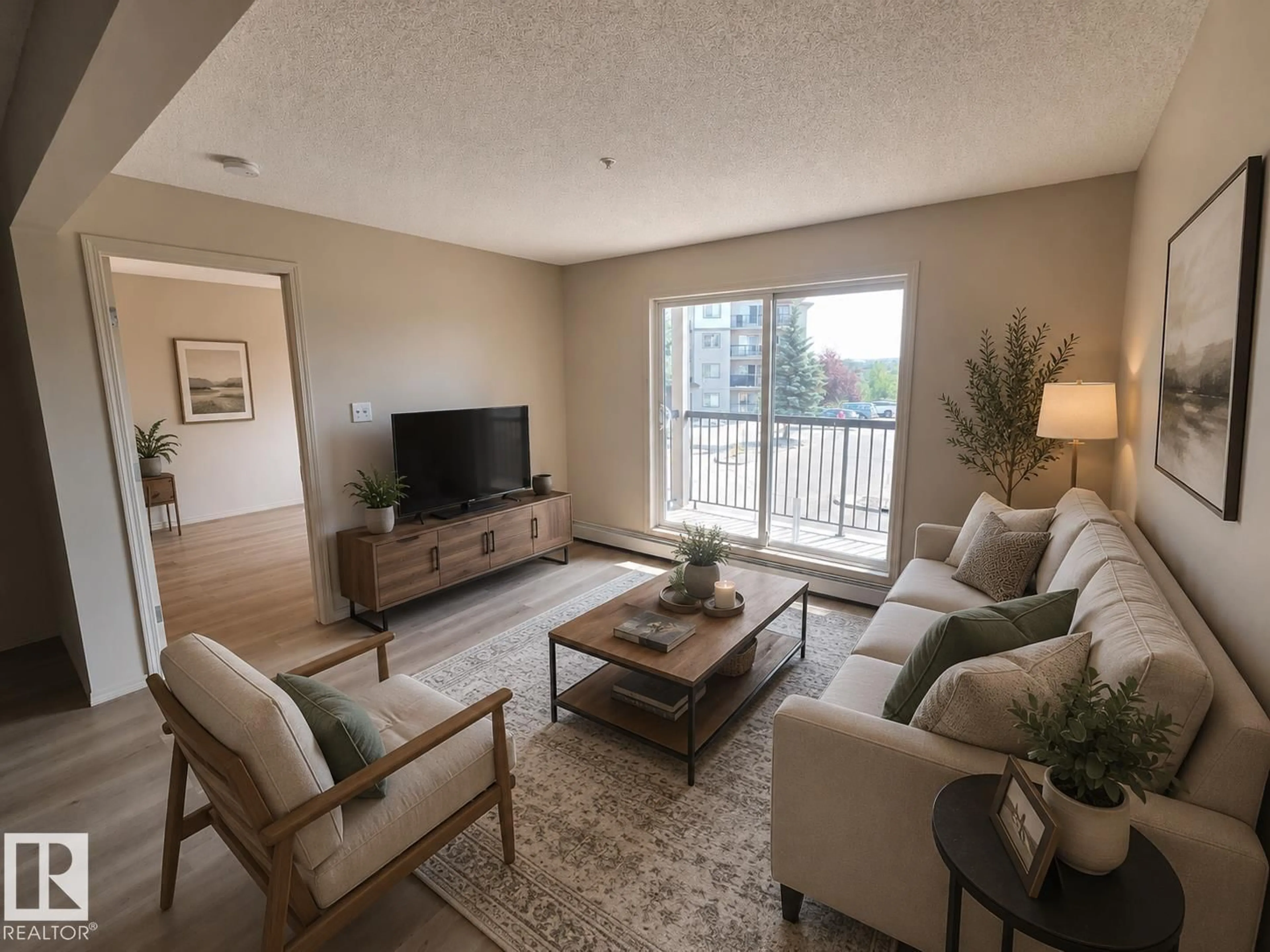 Living room with furniture, unknown for #223 - 1180 HYNDMAN RD, Edmonton Alberta T5A0P8