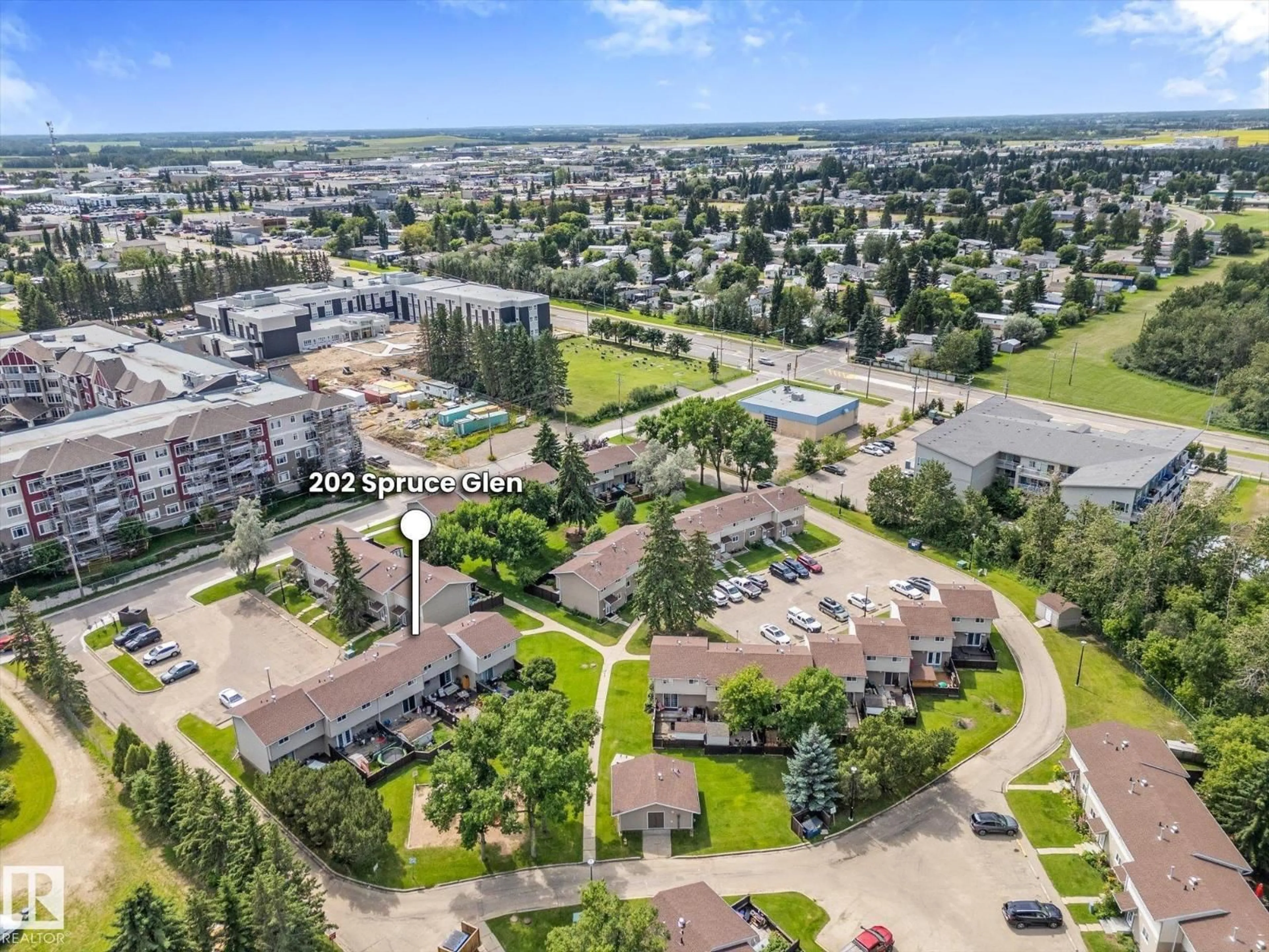 A pic from outside/outdoor area/front of a property/back of a property/a pic from drone, unknown for 202 SPRUCE GL, Spruce Grove Alberta T7X2P6