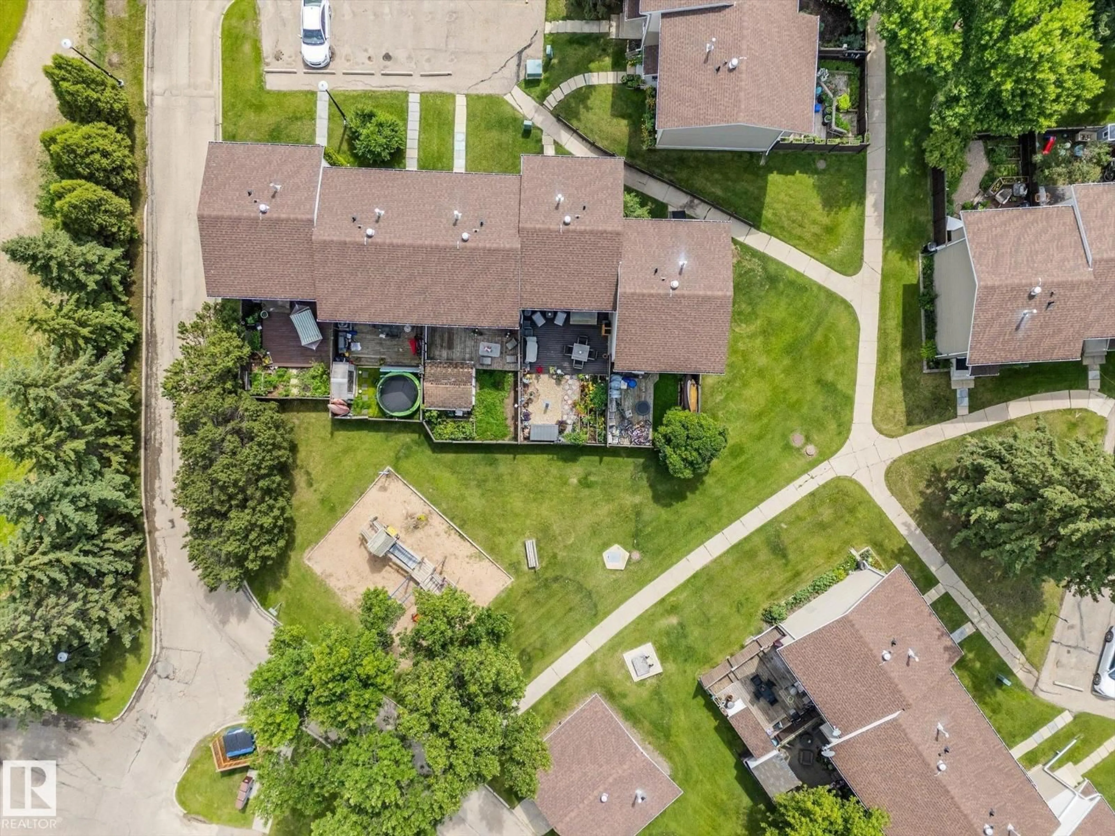 A pic from outside/outdoor area/front of a property/back of a property/a pic from drone, street for 202 SPRUCE GL, Spruce Grove Alberta T7X2P6