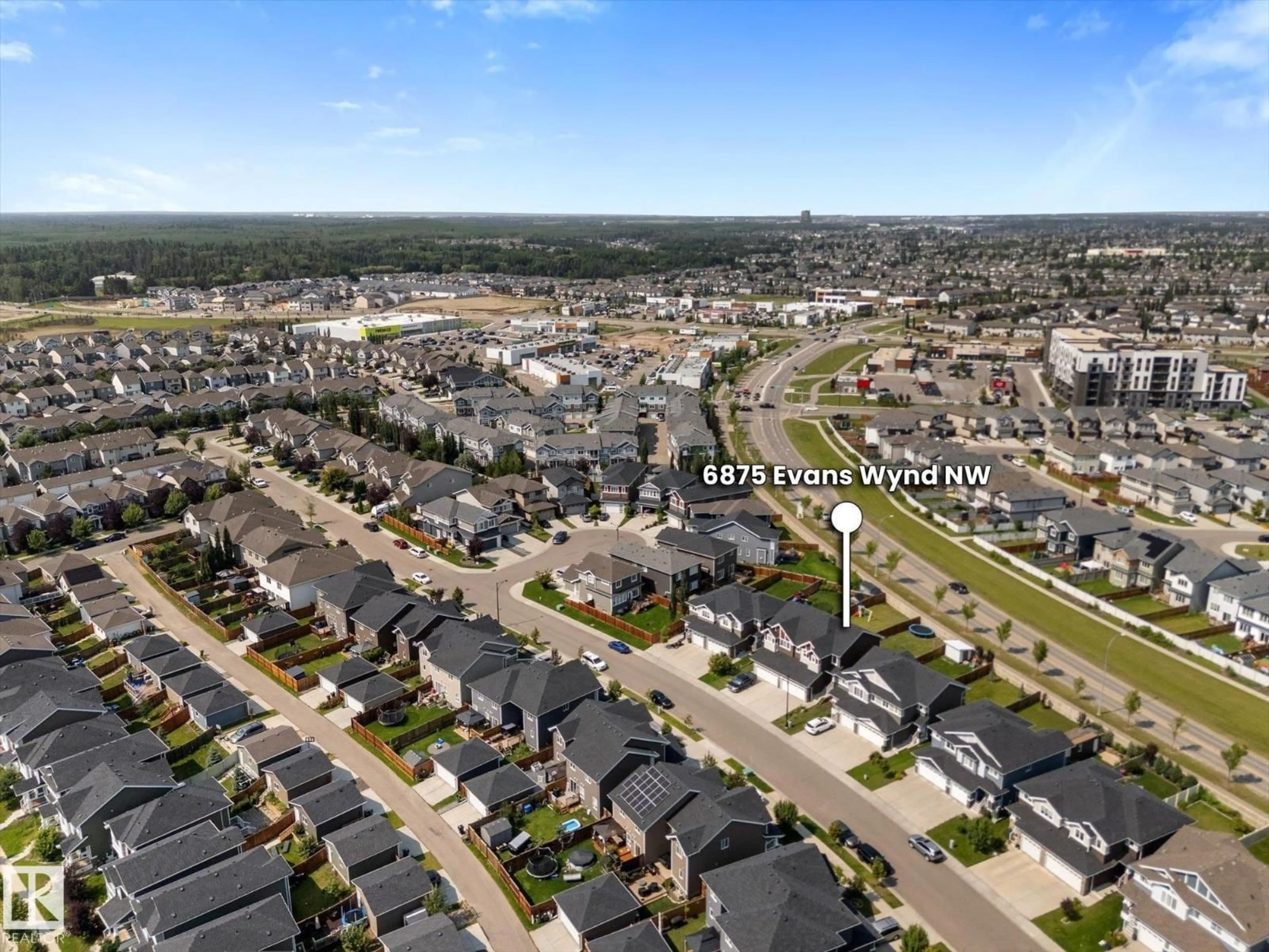 A pic from outside/outdoor area/front of a property/back of a property/a pic from drone, street for 6875 EVANS WD, Edmonton Alberta T6M0T6