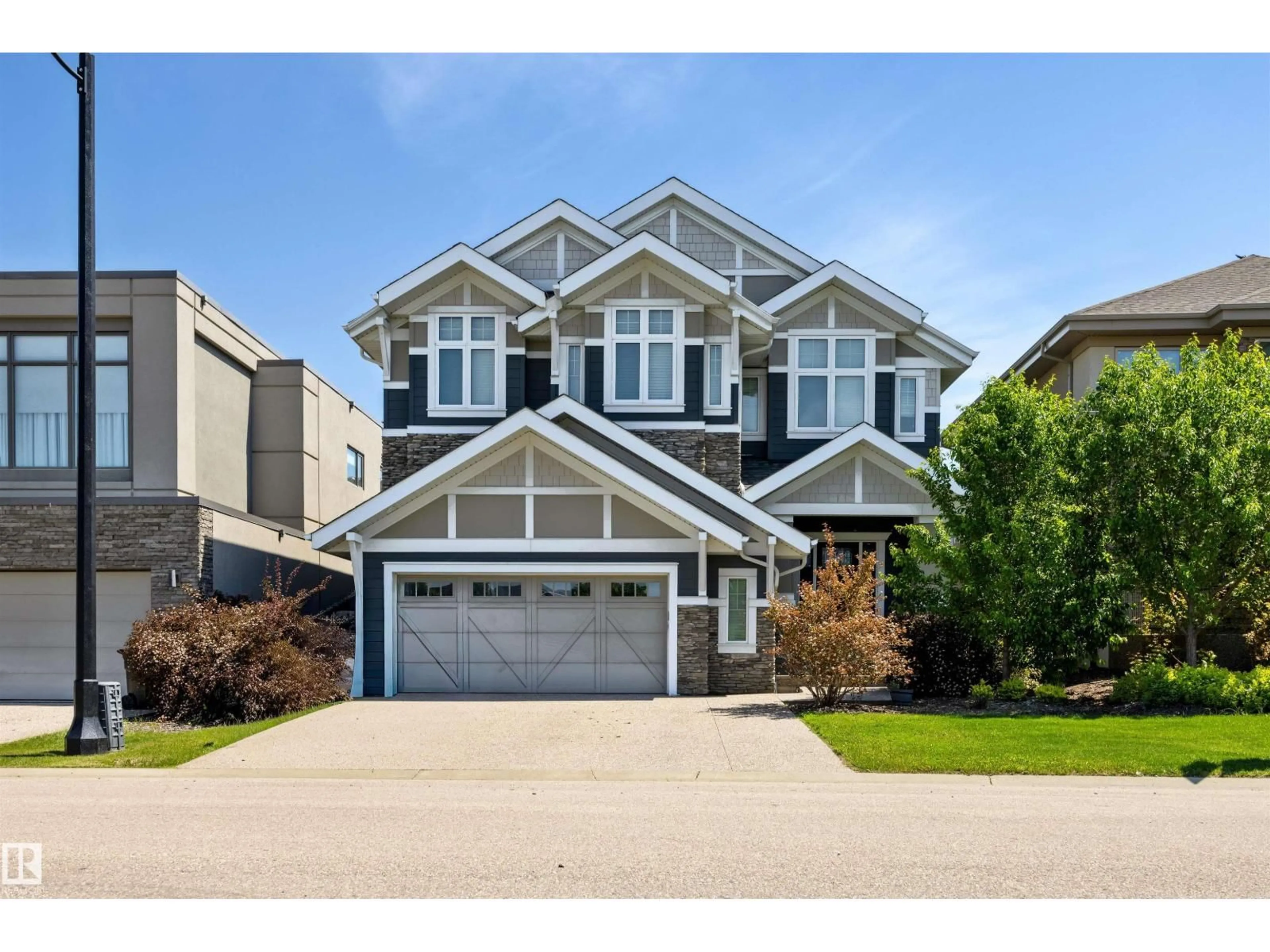 Home with vinyl exterior material, street for 1305 HAINSTOCK WY, Edmonton Alberta T6W3B6