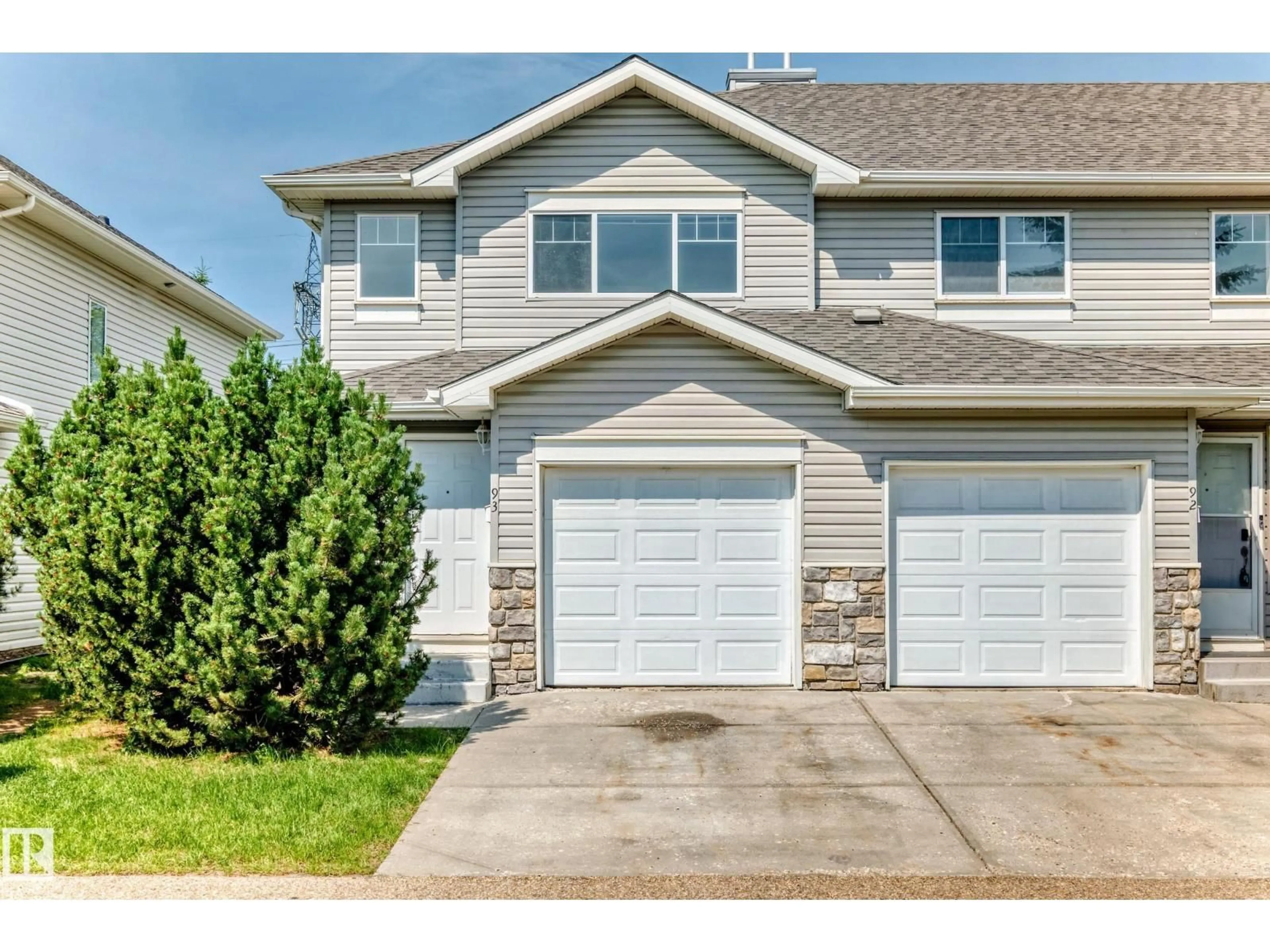 Home with vinyl exterior material, street for 230 - 93 EDWARDS DR, Edmonton Alberta T6X1G7