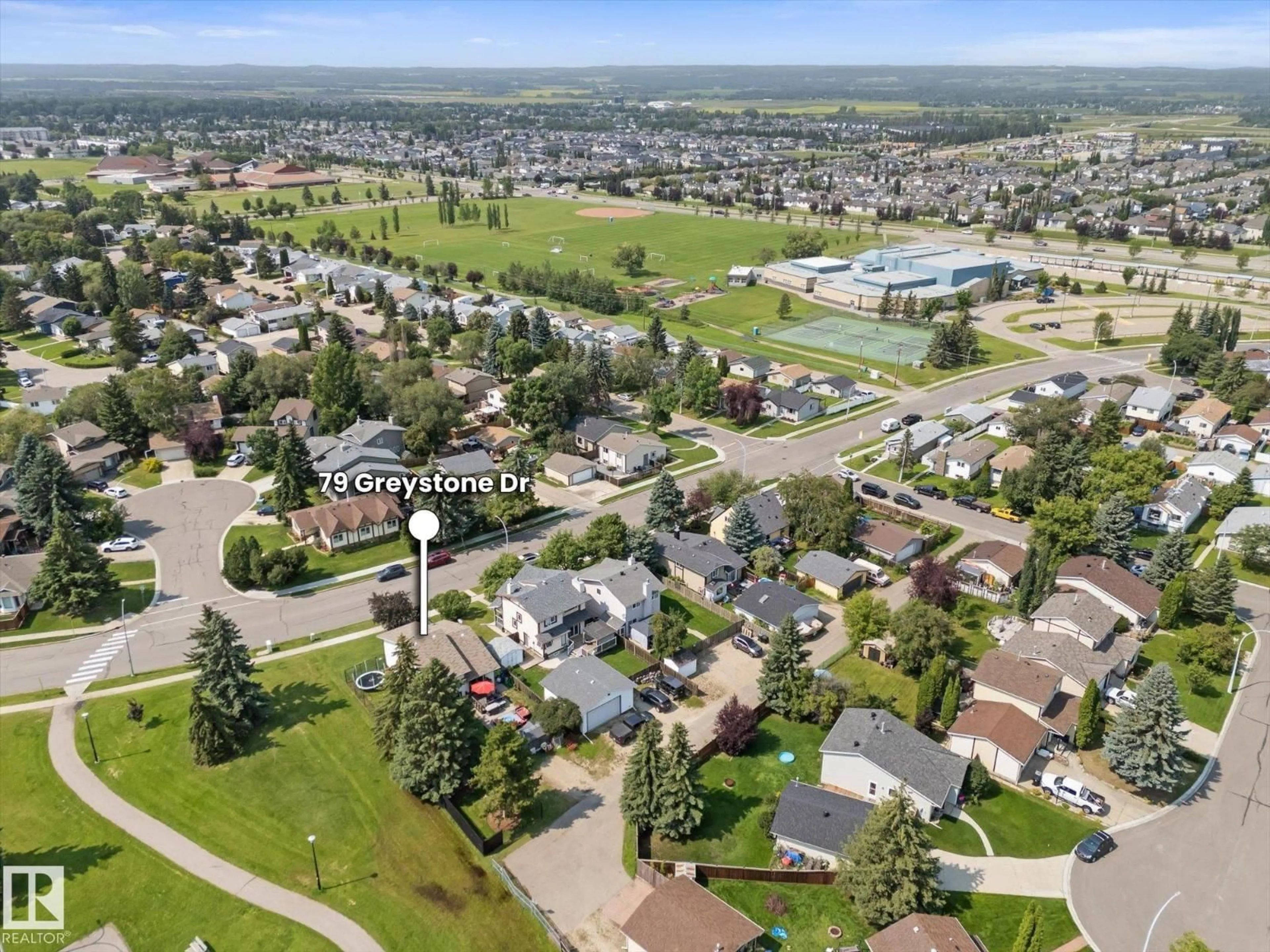 A pic from outside/outdoor area/front of a property/back of a property/a pic from drone, mountain view for 79 GREYSTONE DR, Spruce Grove Alberta T7X1Y7