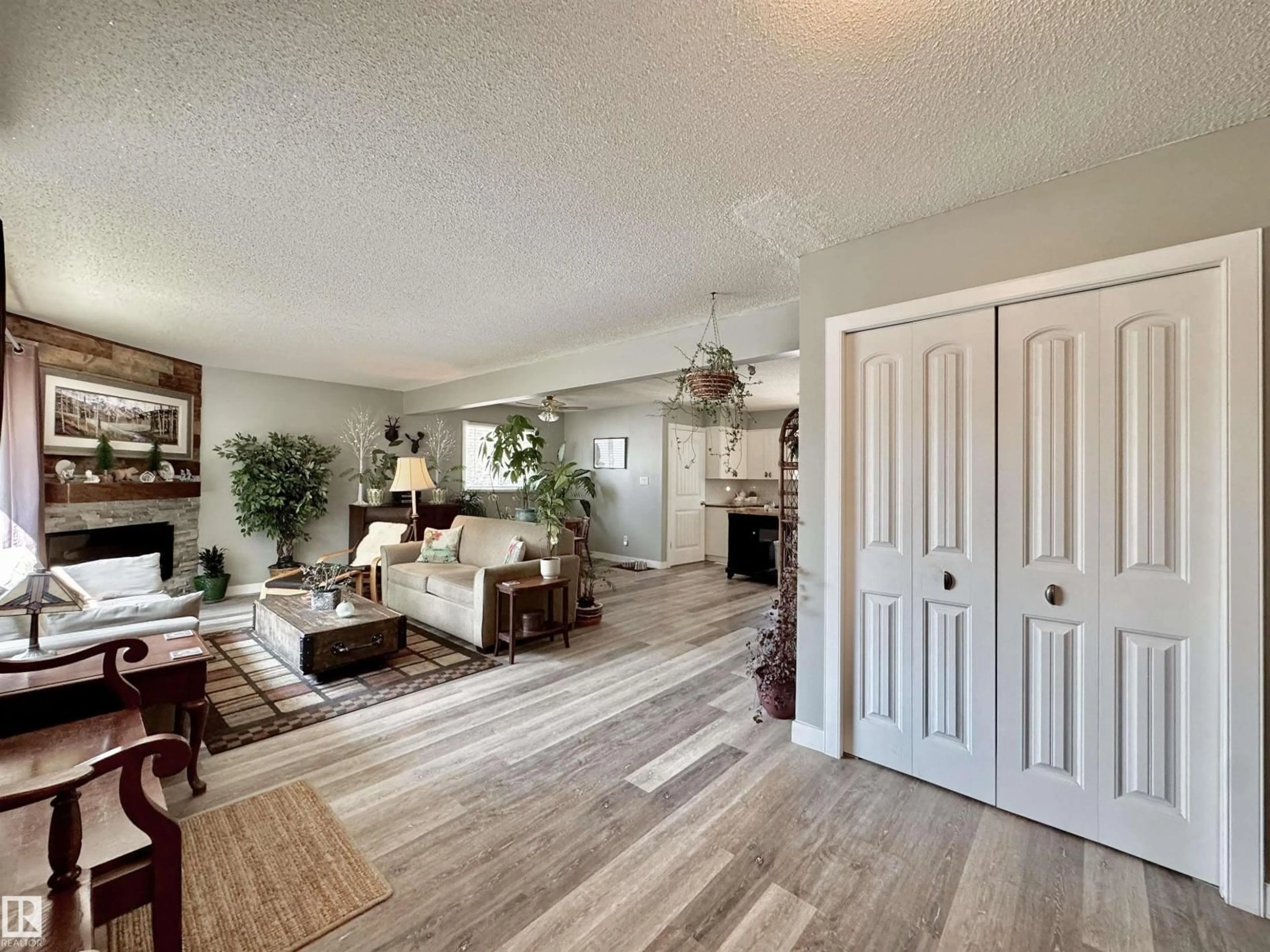 Living room with furniture, wood/laminate floor for 119 GARLAND CR, Sherwood Park Alberta T8A2R1