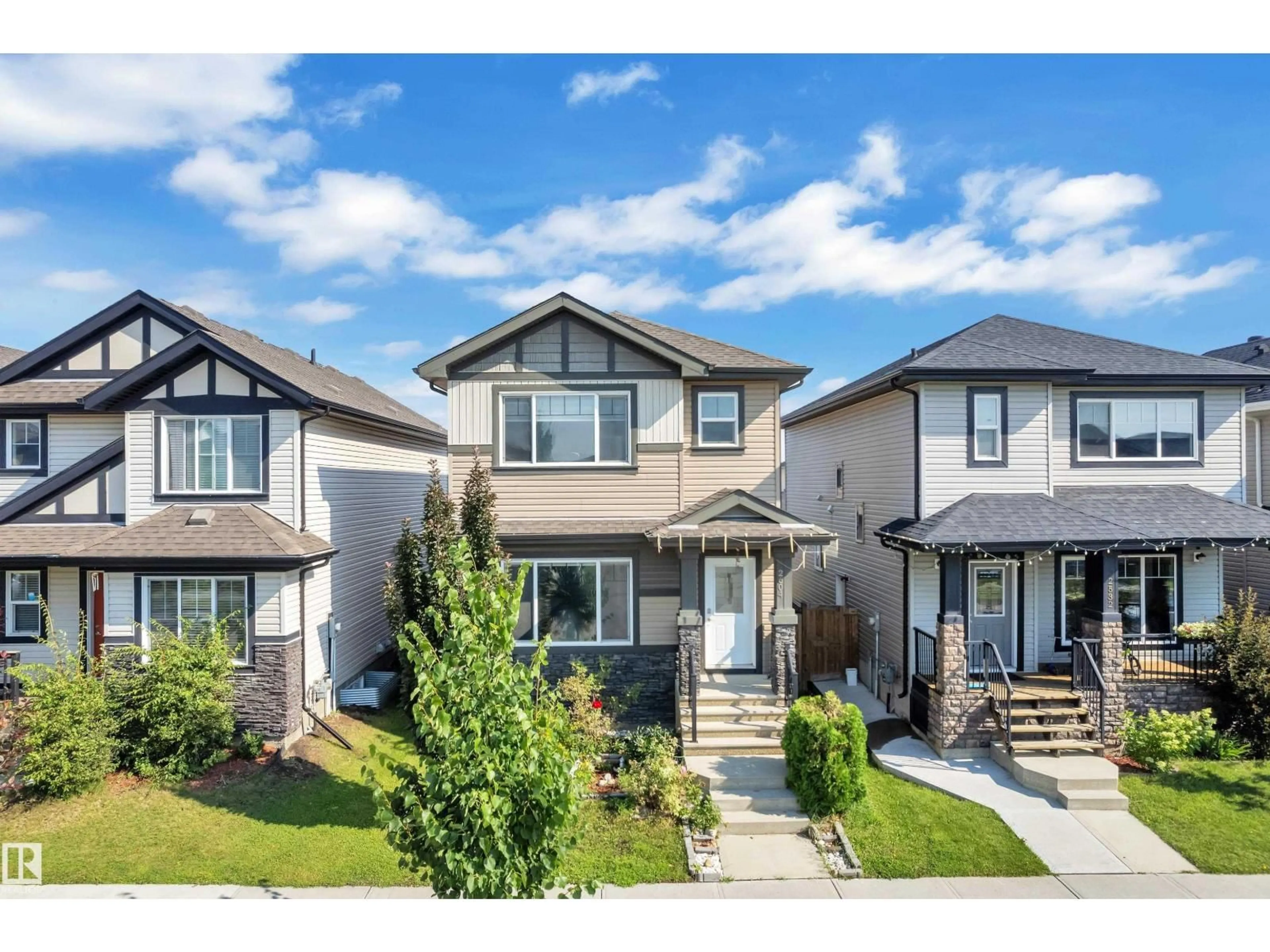 Home with vinyl exterior material, street for 2604 20 AV, Edmonton Alberta T6T0Y7