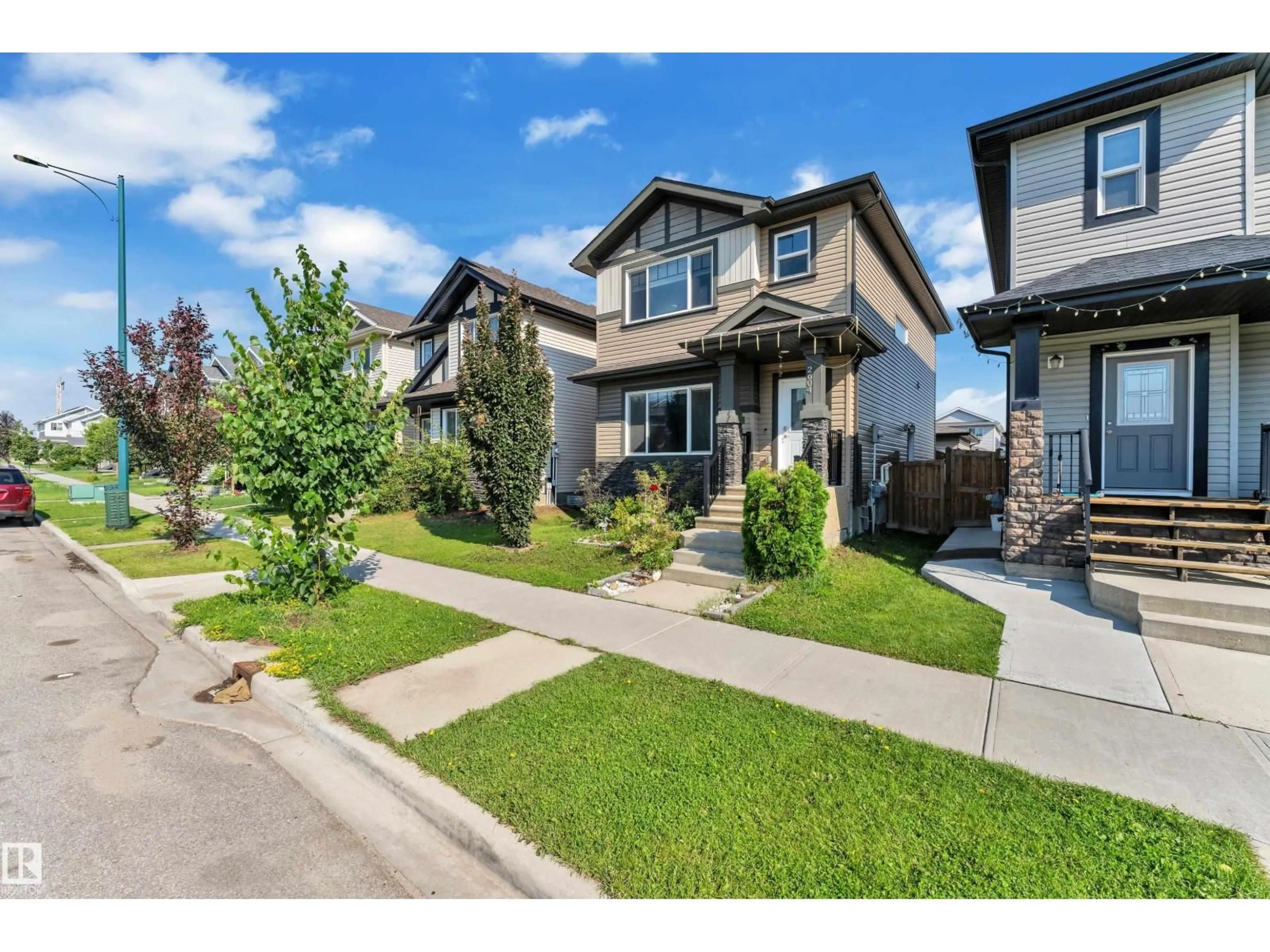 A pic from outside/outdoor area/front of a property/back of a property/a pic from drone, street for 2604 20 AV, Edmonton Alberta T6T0Y7