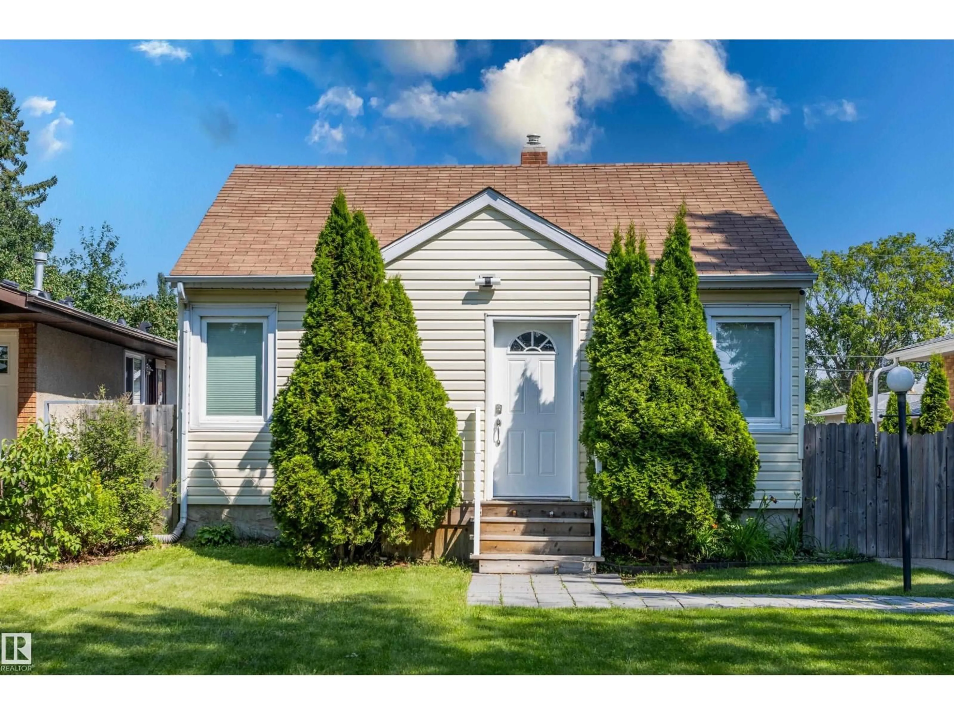 Home with vinyl exterior material, street for NW - 12431 81 ST, Edmonton Alberta T5B2T6
