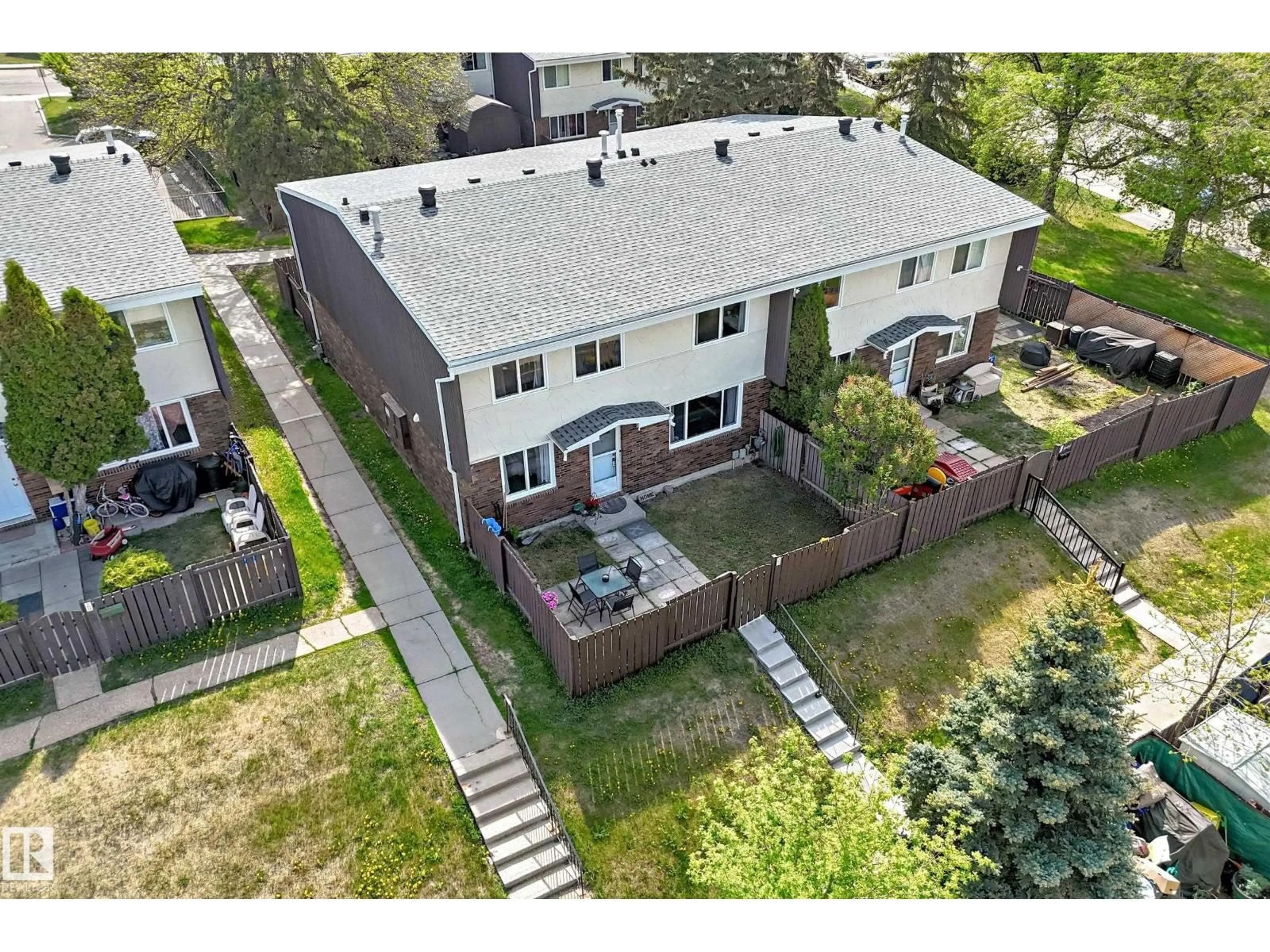 A pic from outside/outdoor area/front of a property/back of a property/a pic from drone, street for NW - 167 ROSELAND VG, Edmonton Alberta T5E5R6