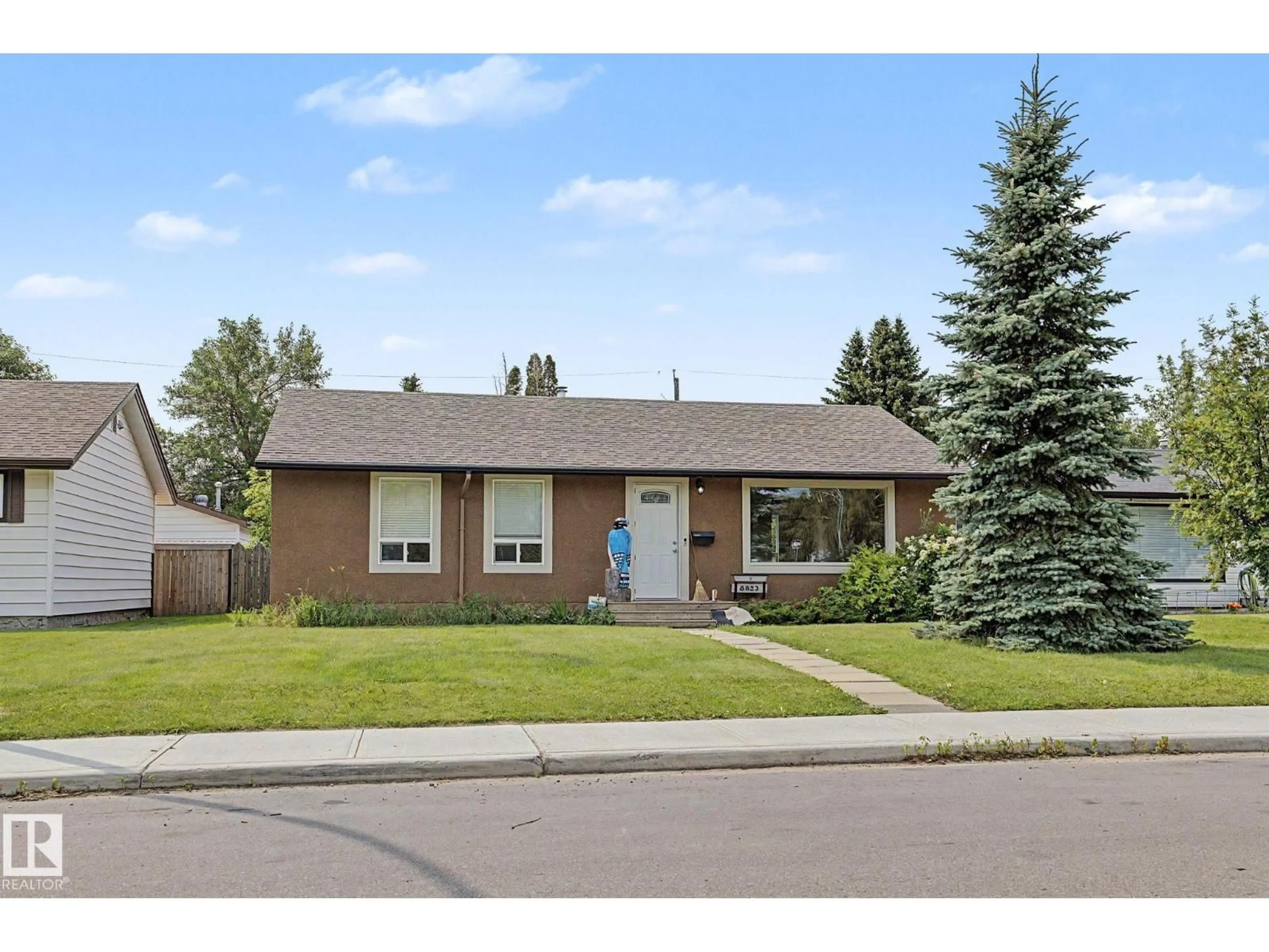 Home with brick exterior material, street for NW - 8823 130A AV, Edmonton Alberta T5E0V7