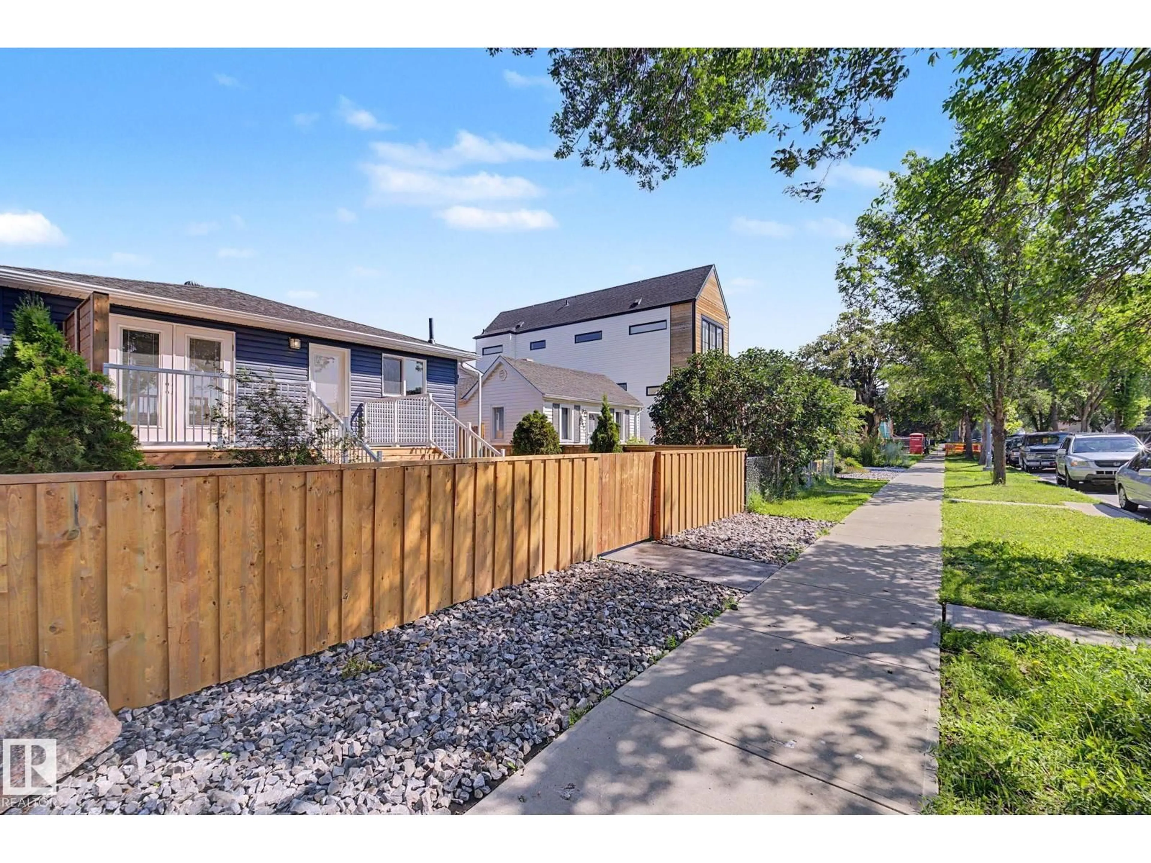 A pic from outside/outdoor area/front of a property/back of a property/a pic from drone, street for 10570 66 AV, Edmonton Alberta T6H1X4