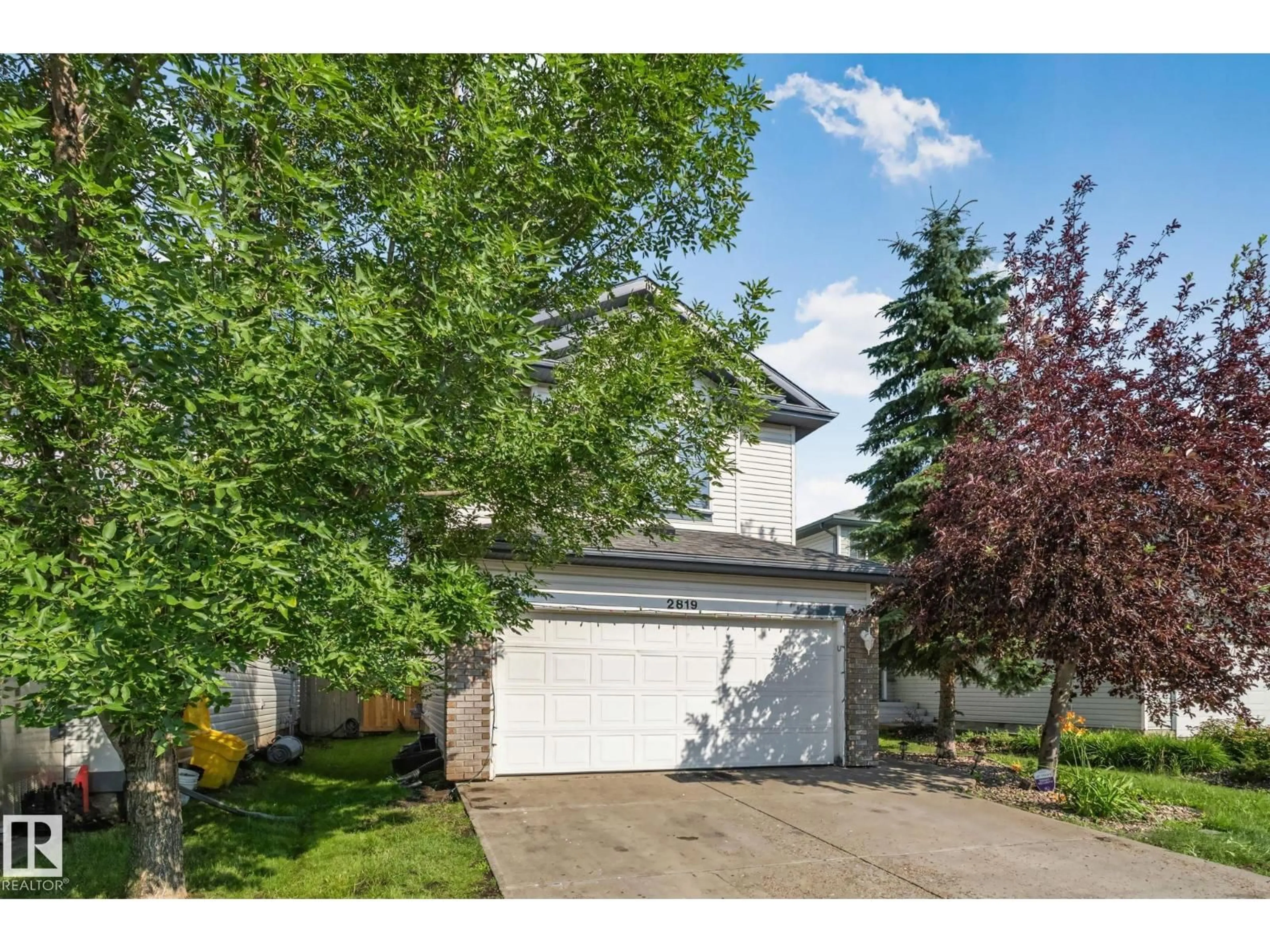 Home with vinyl exterior material, street for NW - 2819 33 ST, Edmonton Alberta T6T1P5