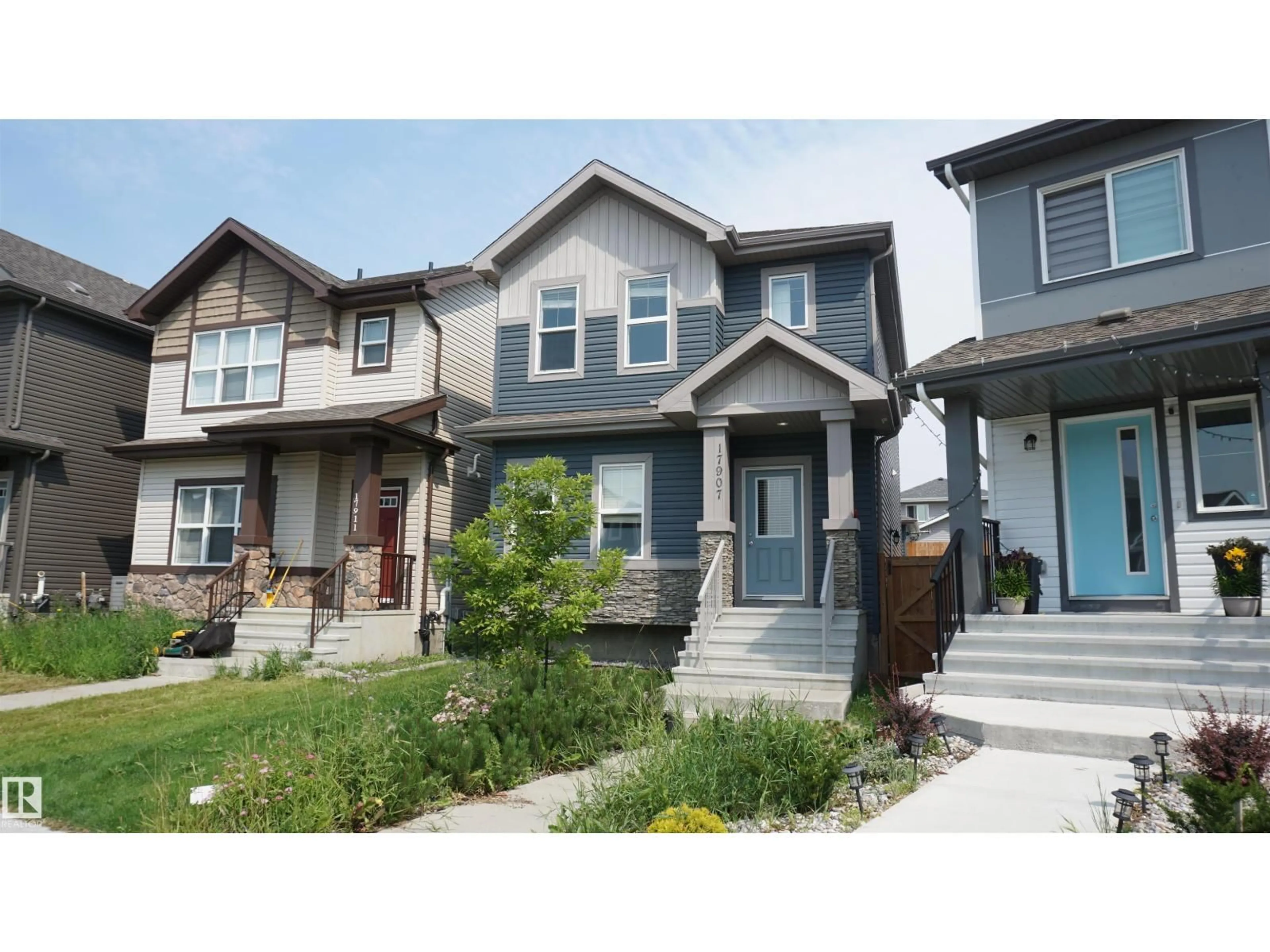 Home with vinyl exterior material, street for 17907 62 ST NW, Edmonton Alberta T5Y3Z4