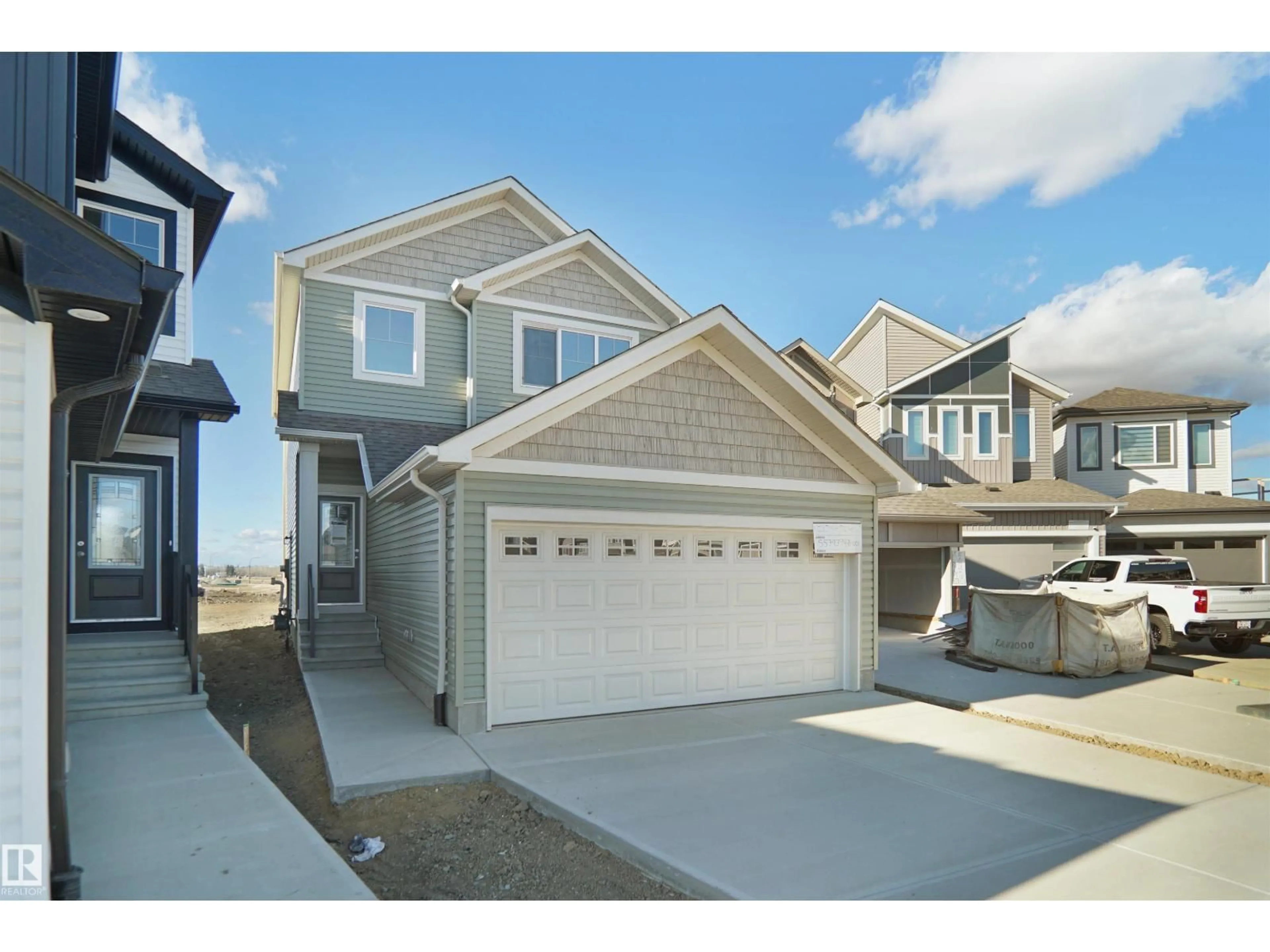 Home with vinyl exterior material, street for 15 LEMON CL, Spruce Grove Alberta T7X4V4