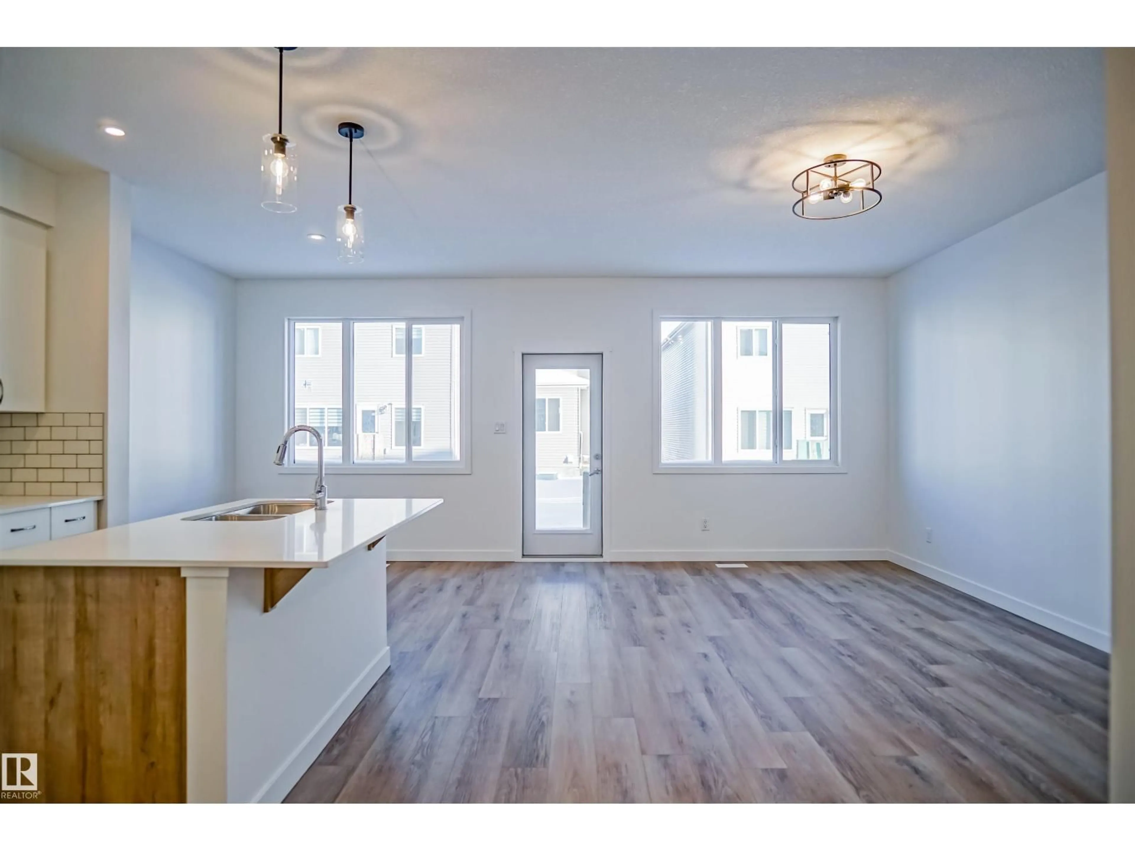 Open concept kitchen, wood/laminate floor for 15 LEMON CL, Spruce Grove Alberta T7X4V4