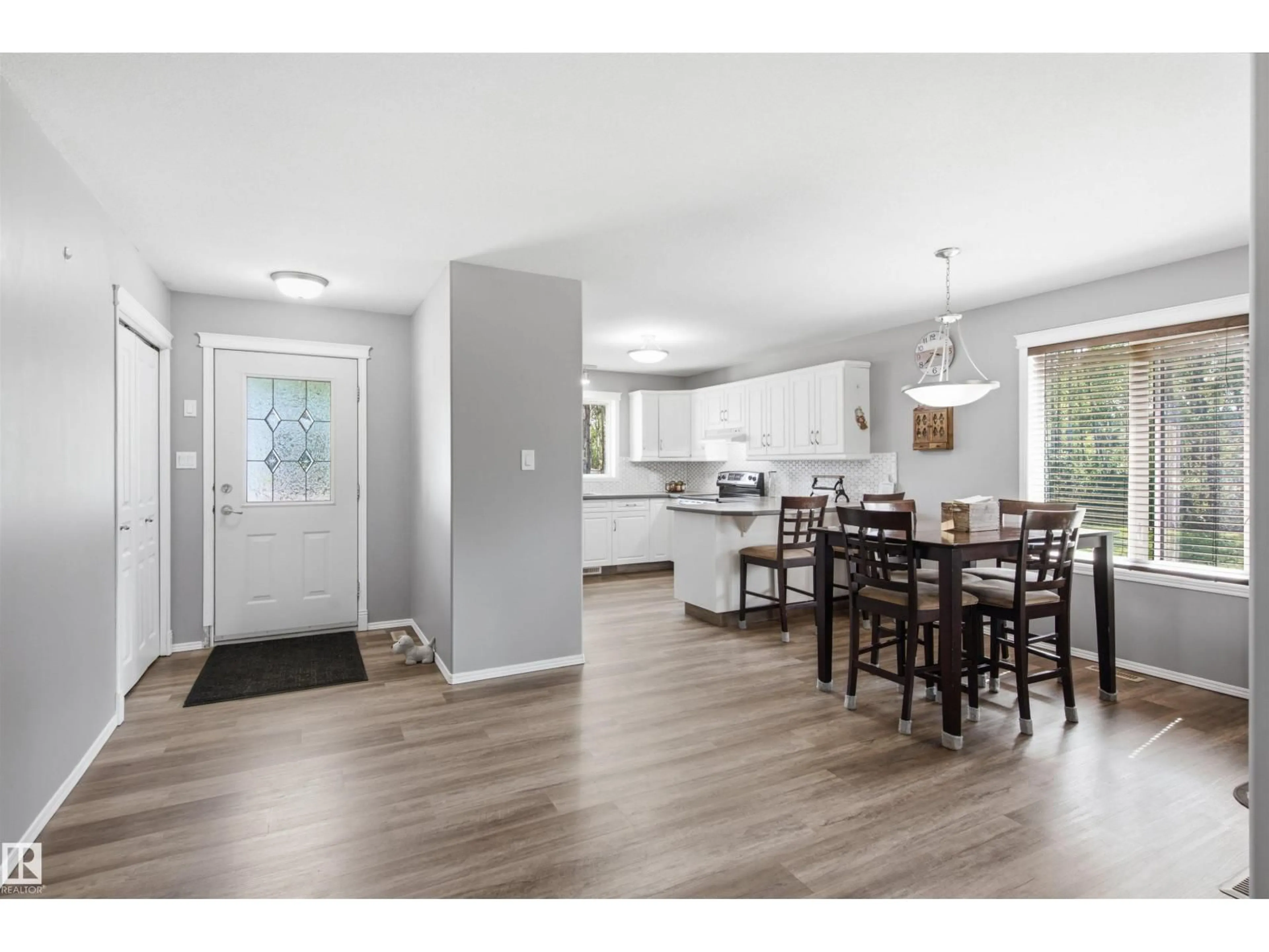 Open concept kitchen, wood/laminate floor for 63320 RGE RD 435, Rural Bonnyville M.D. Alberta T9M1P3