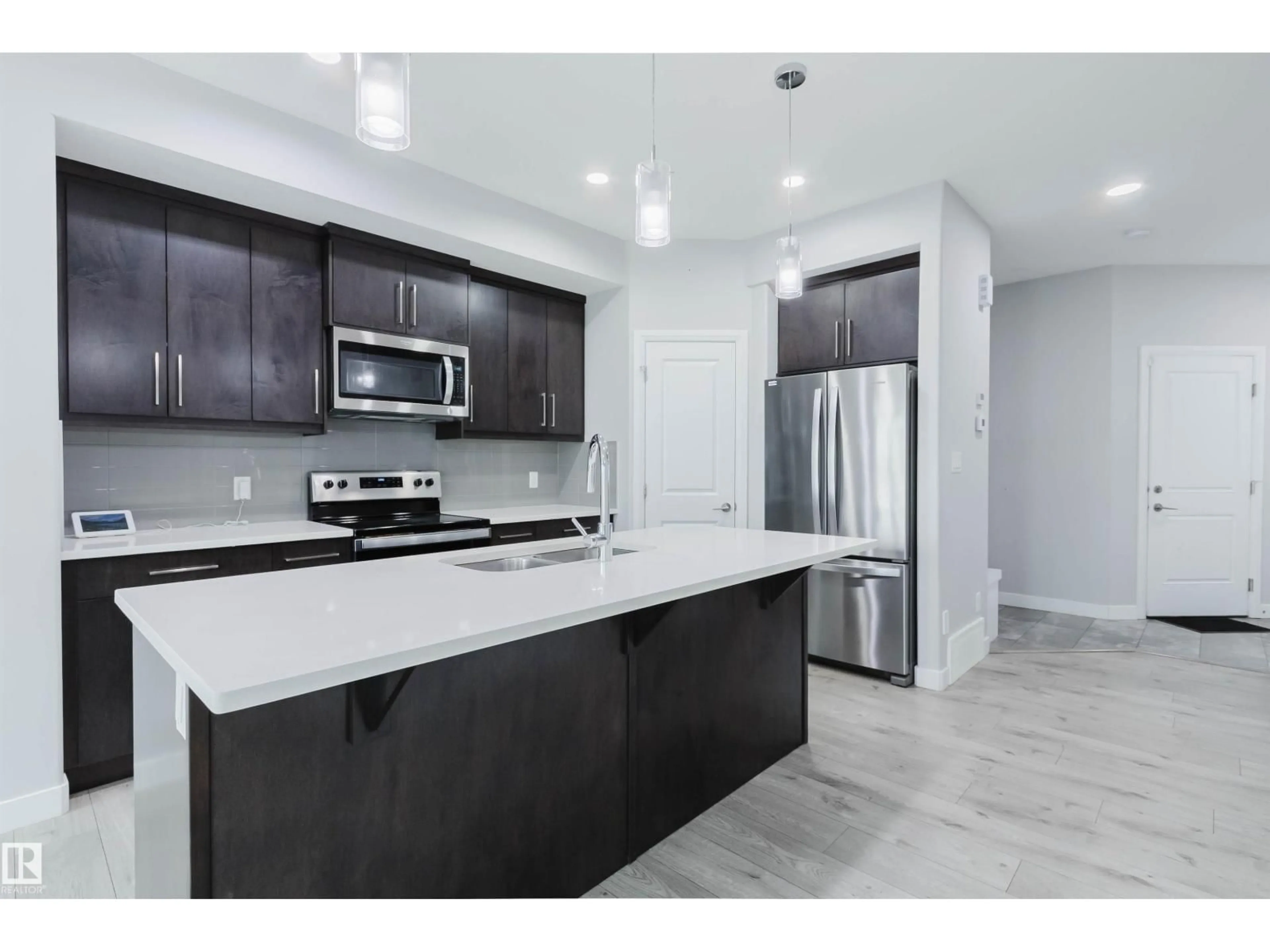 Open concept kitchen, ceramic/tile floor for 6345 CARTMELL RD, Edmonton Alberta T6W4A3