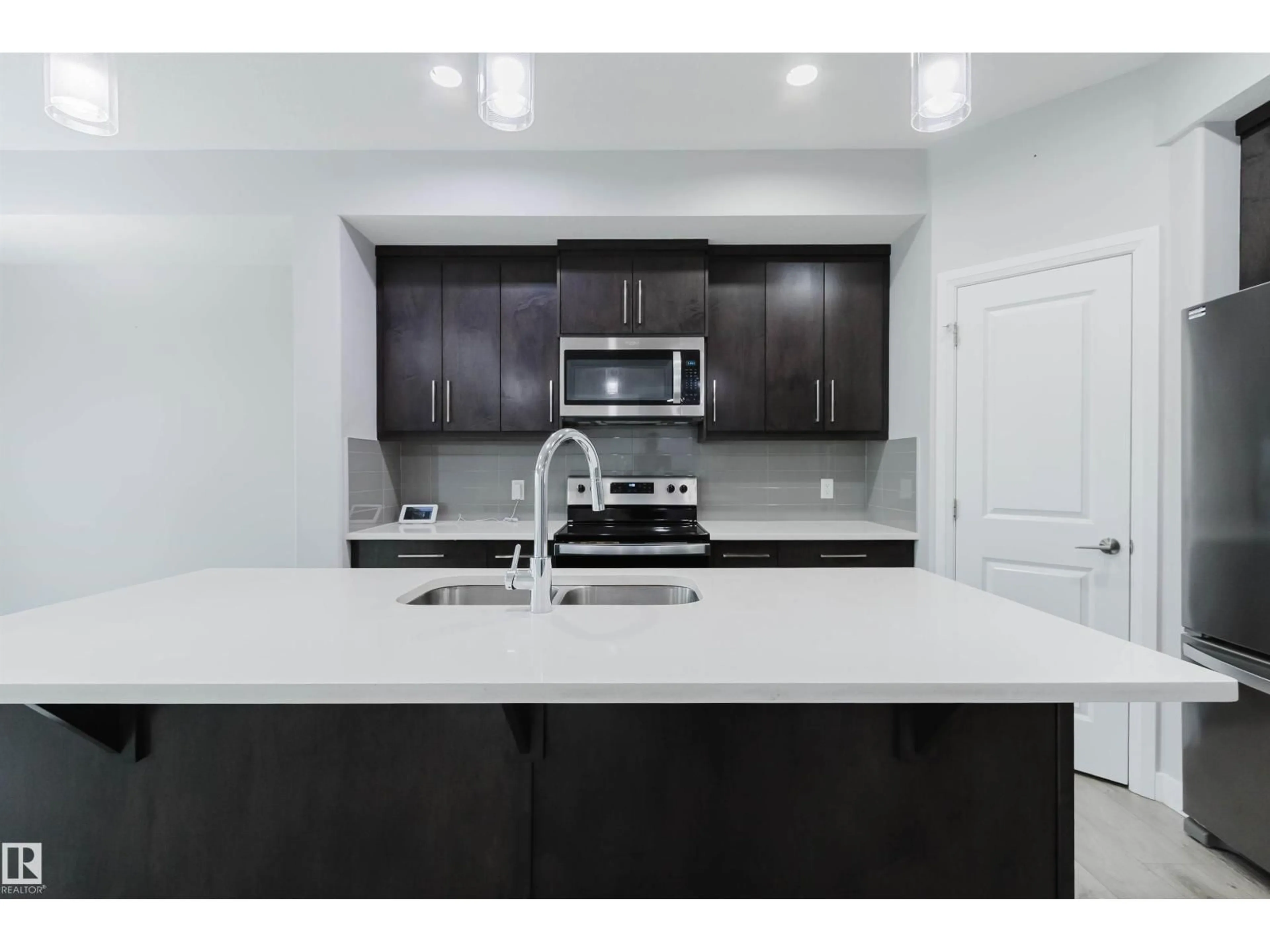 Standard kitchen, ceramic/tile floor for 6345 CARTMELL RD, Edmonton Alberta T6W4A3