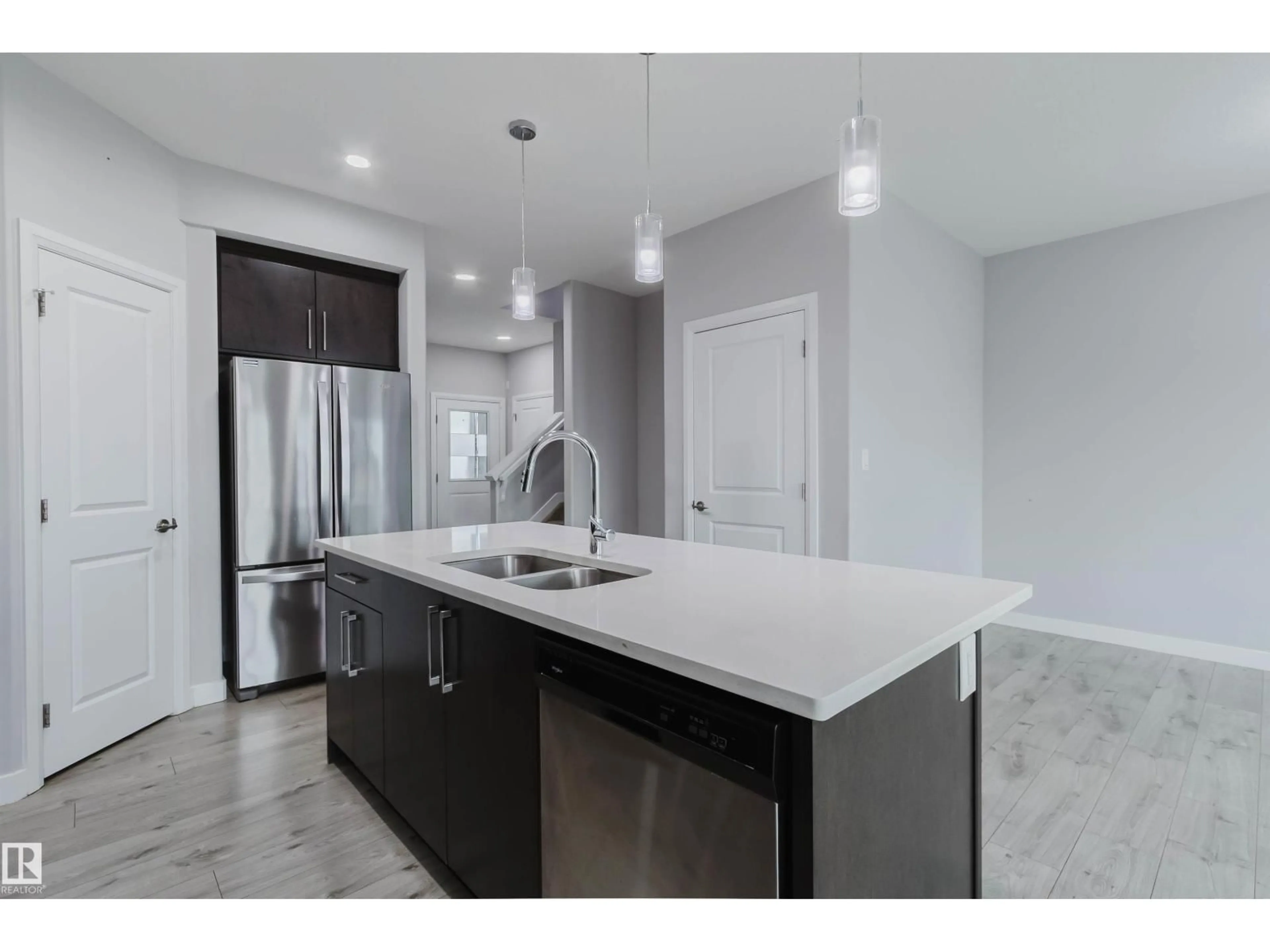 Open concept kitchen, ceramic/tile floor for 6345 CARTMELL RD, Edmonton Alberta T6W4A3