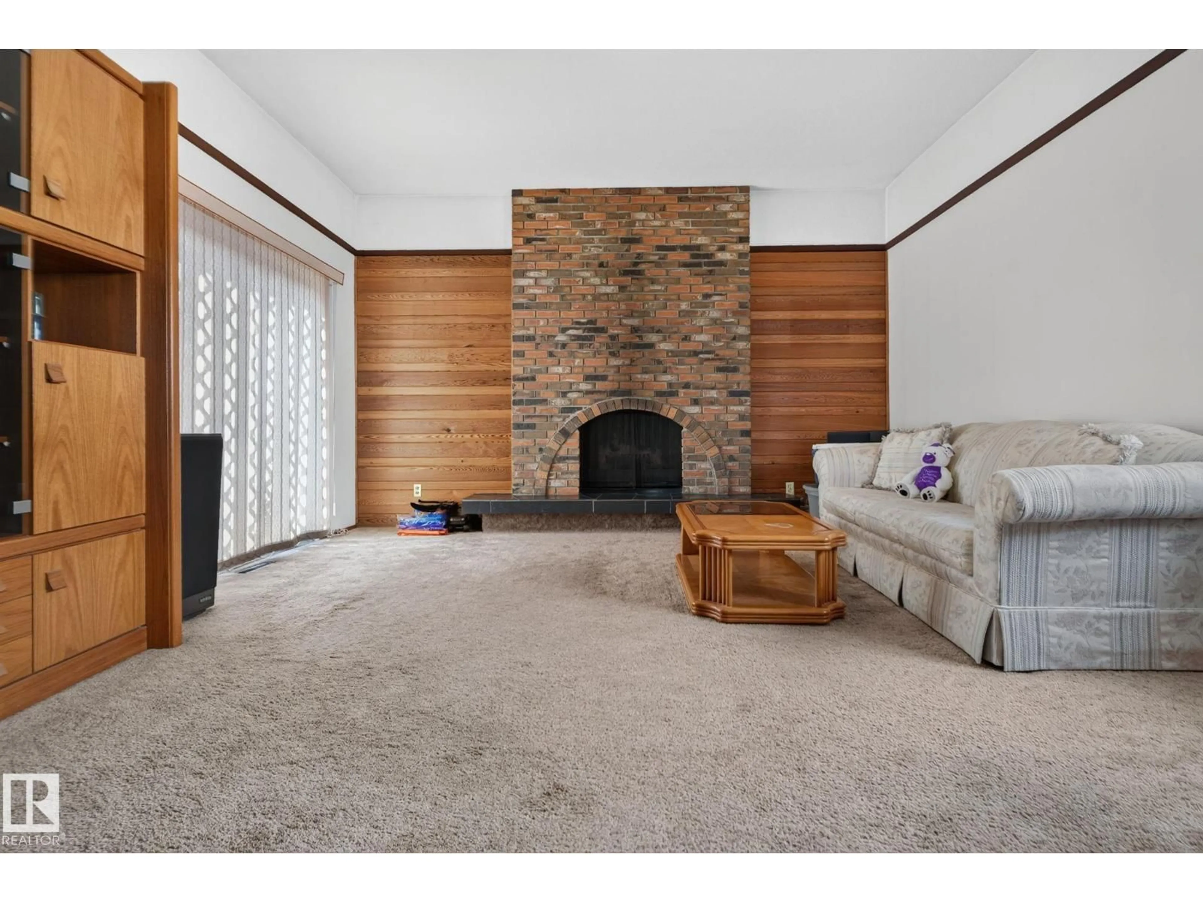 Living room with furniture, unknown for NW - 6012 145 AV, Edmonton Alberta T5A1S7