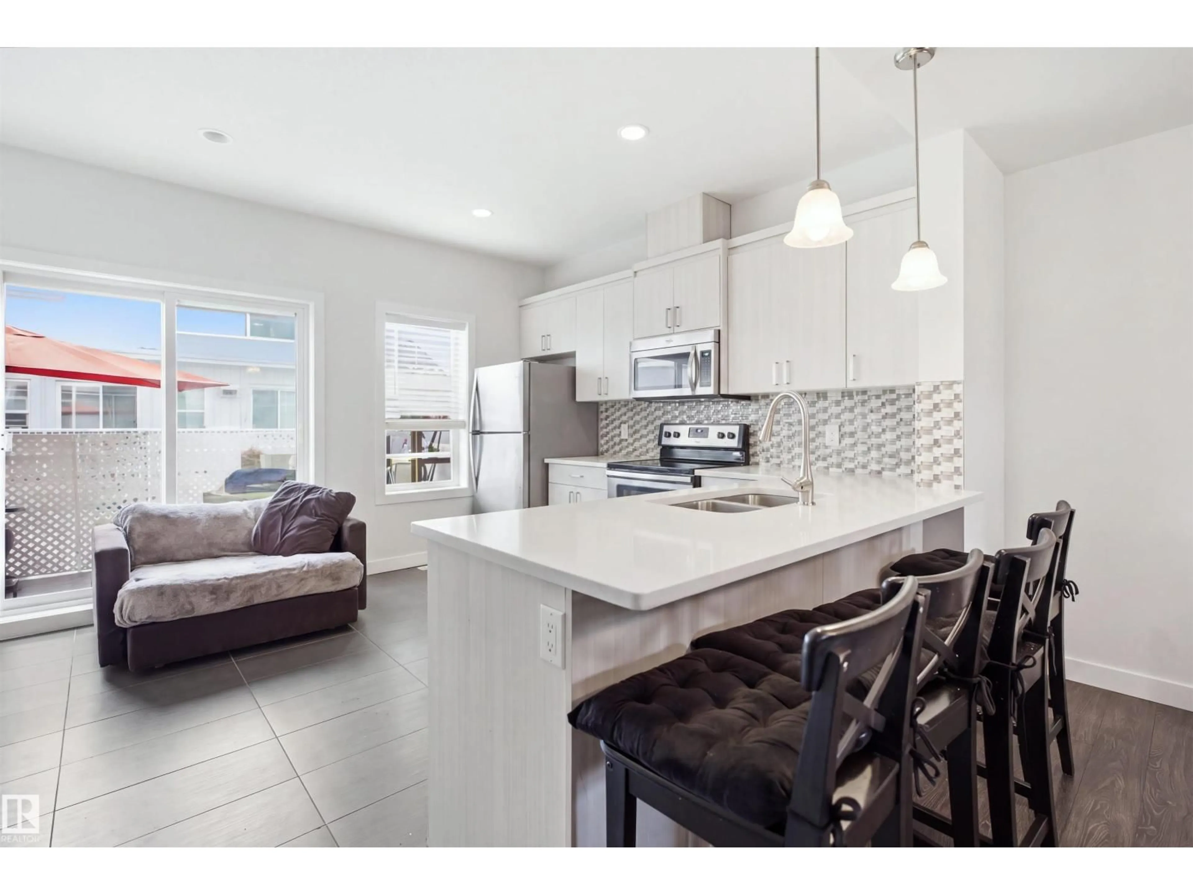 Open concept kitchen, ceramic/tile floor for 22 723 172 ST SW, Edmonton Alberta T6W2N6