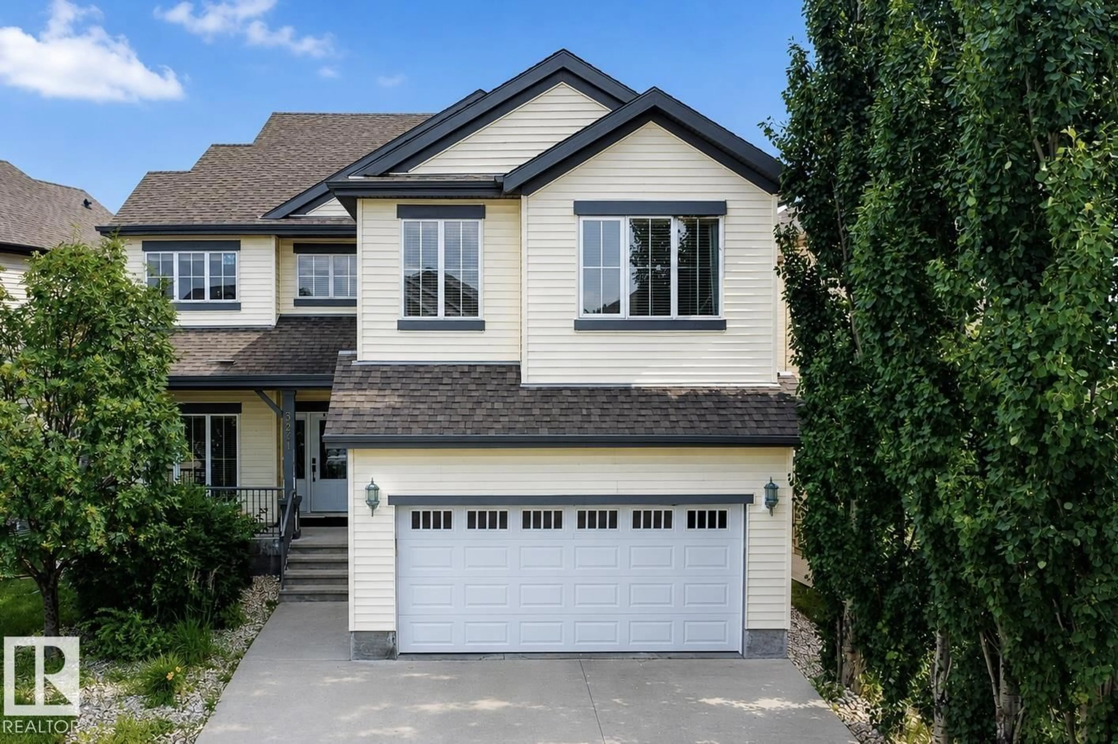 Home with vinyl exterior material, street for 5931 12 AV, Edmonton Alberta T6X0M7