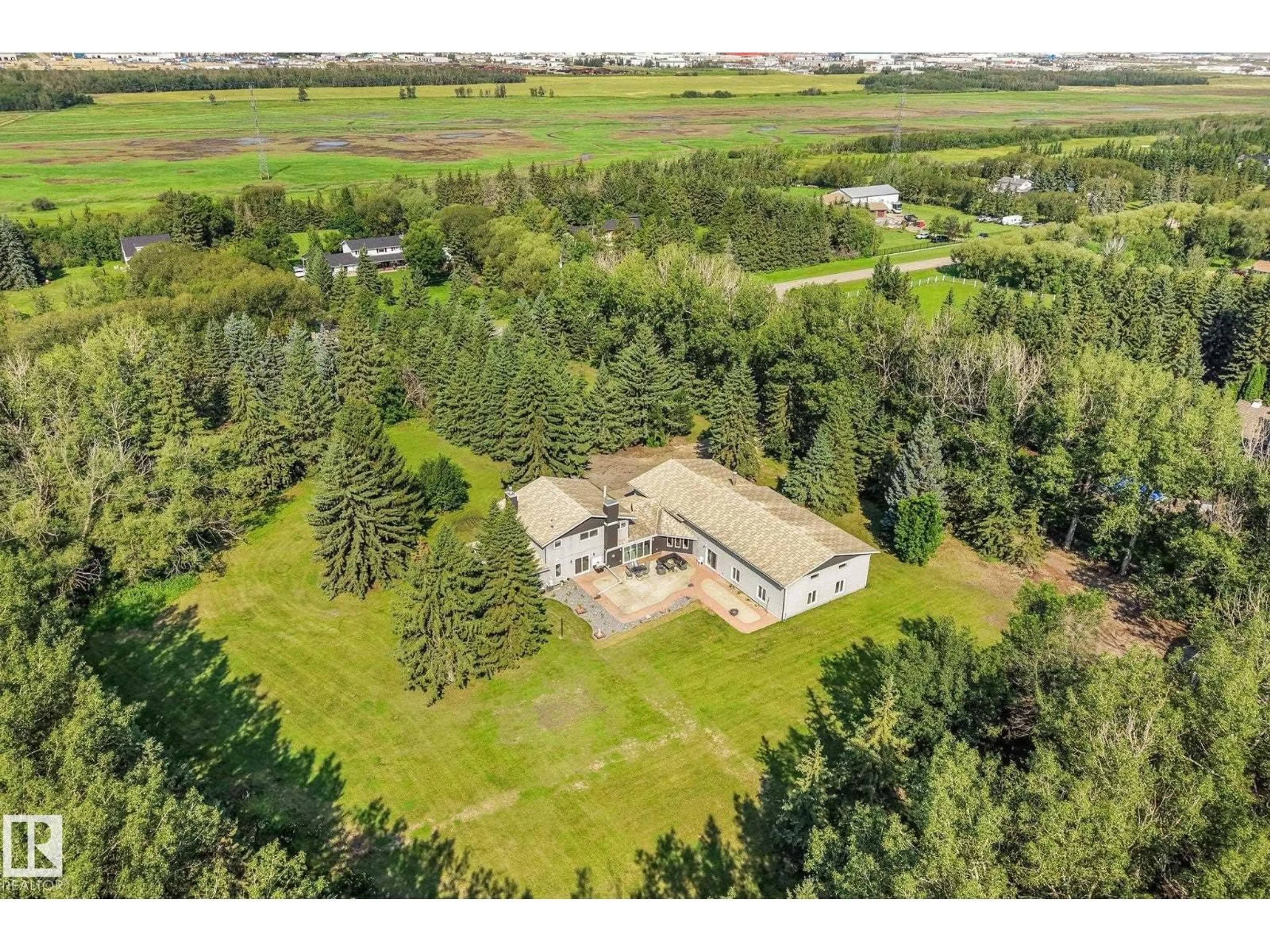 A pic from outside/outdoor area/front of a property/back of a property/a pic from drone, building for 50 50202 RGE RD 244, Rural Leduc County Alberta T4X0P4