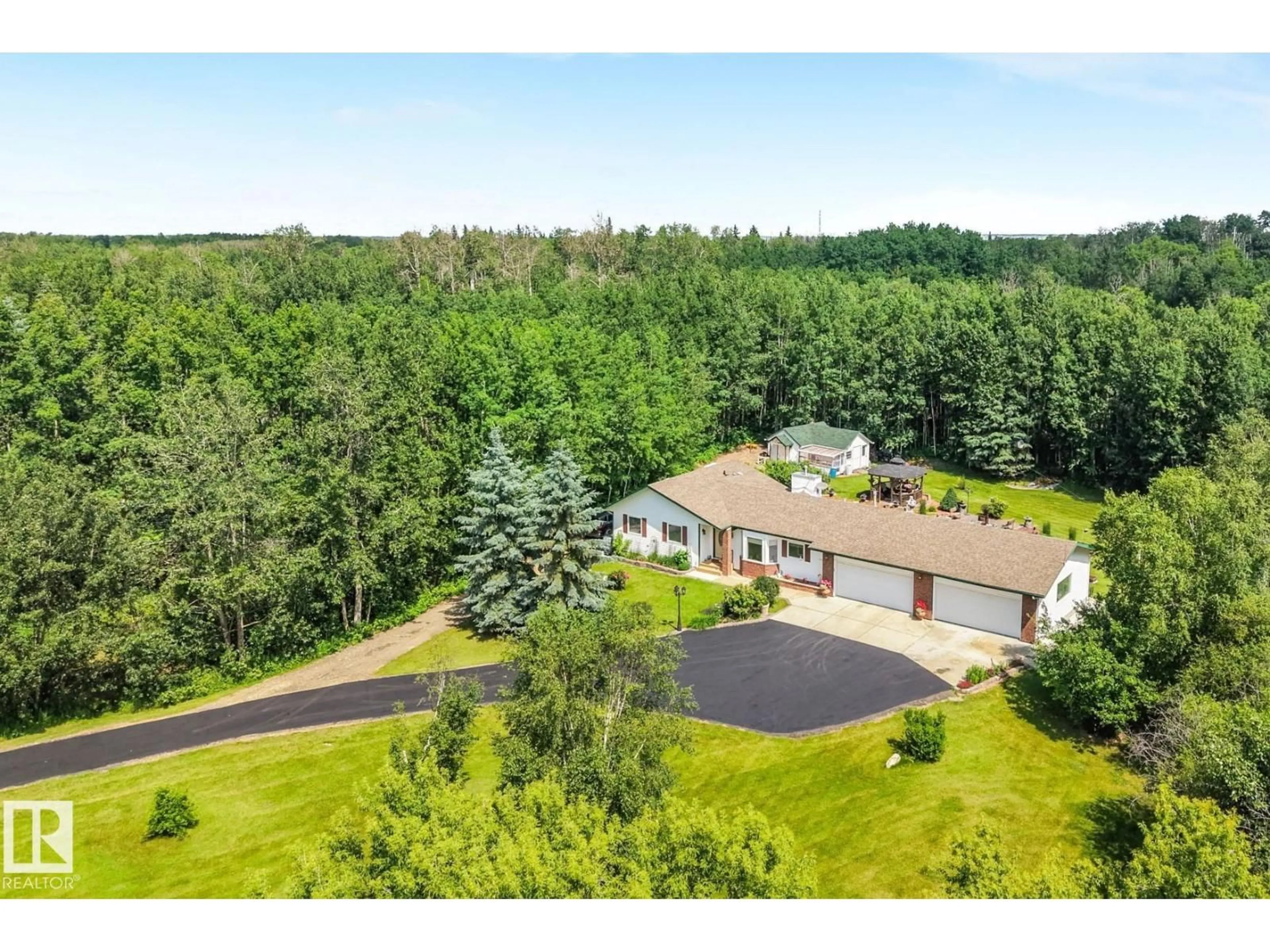 A pic from outside/outdoor area/front of a property/back of a property/a pic from drone, forest/trees view for 21252 - 170 TWP ROAD 530, Rural Strathcona County Alberta T8G2C4