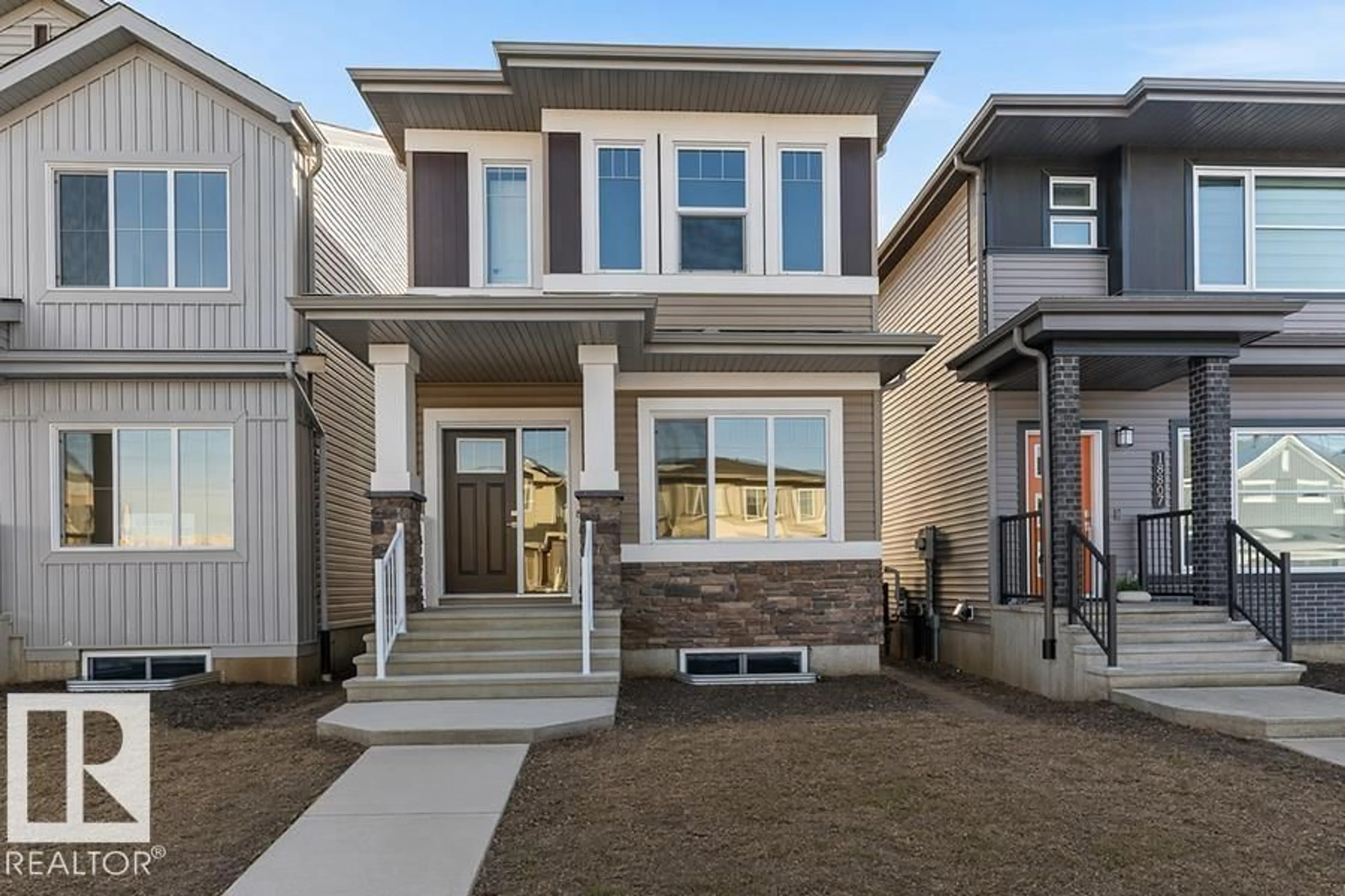 Home with vinyl exterior material, street for 18863 29 AV, Edmonton Alberta T5T4T8